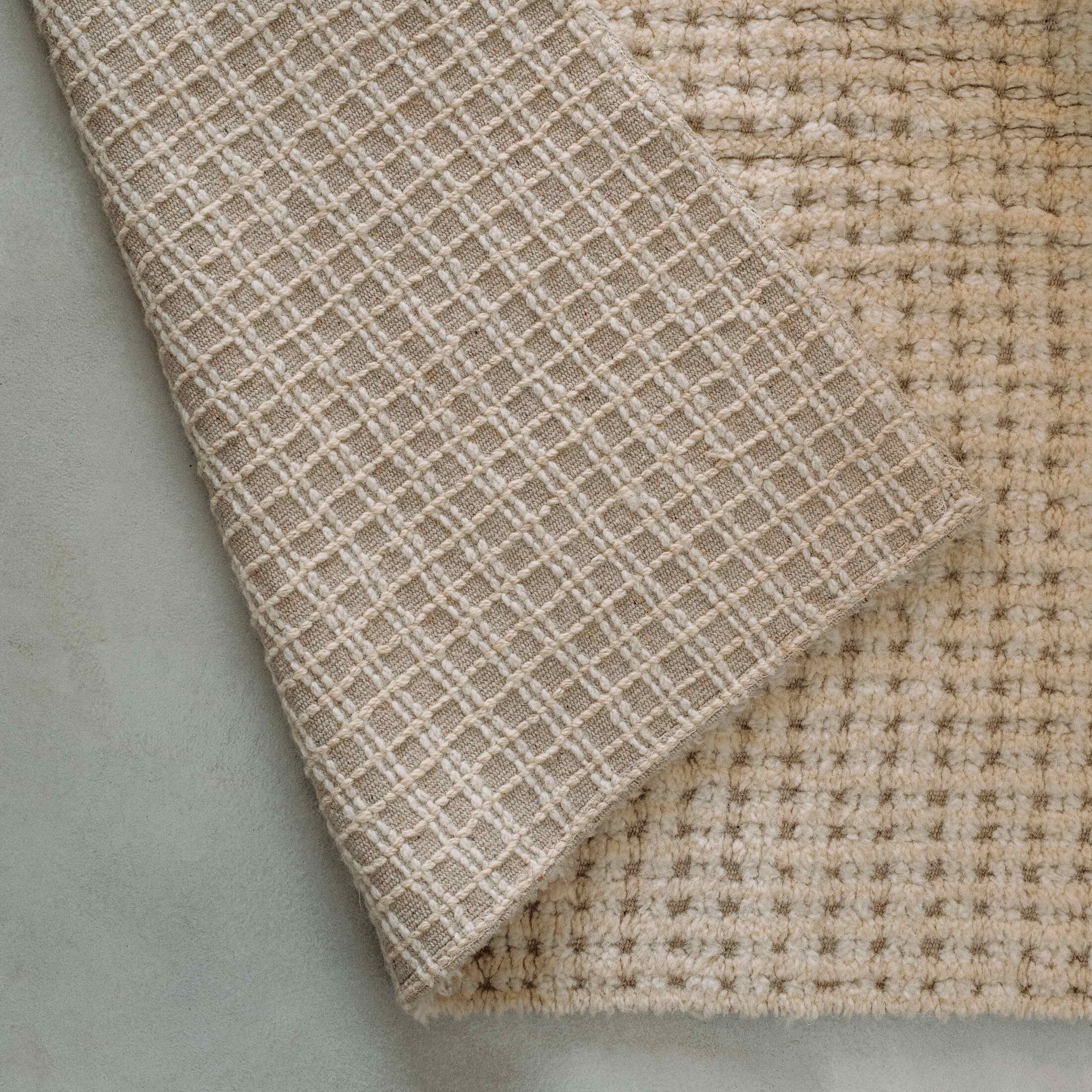 Ullmatta Eden, från LORENA CANALS, i färgen naturlig duk, naturlig, snäckskal. Klicka för att öppna bilden i stort format