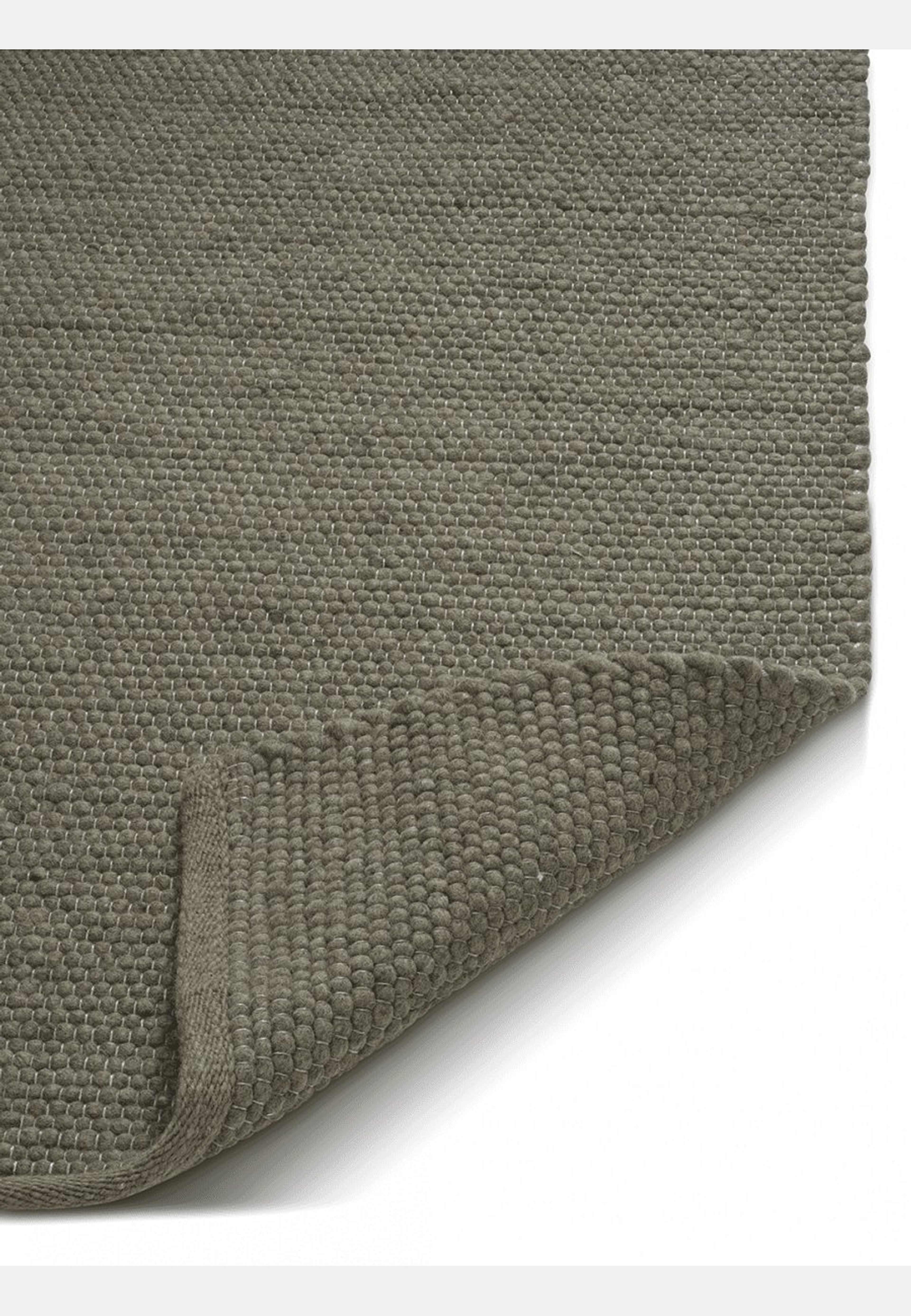 Gångmatta Merino Mörkgrön, från Classic Collection, i färgen mörkgrön. Klicka för att öppna bilden i stort format