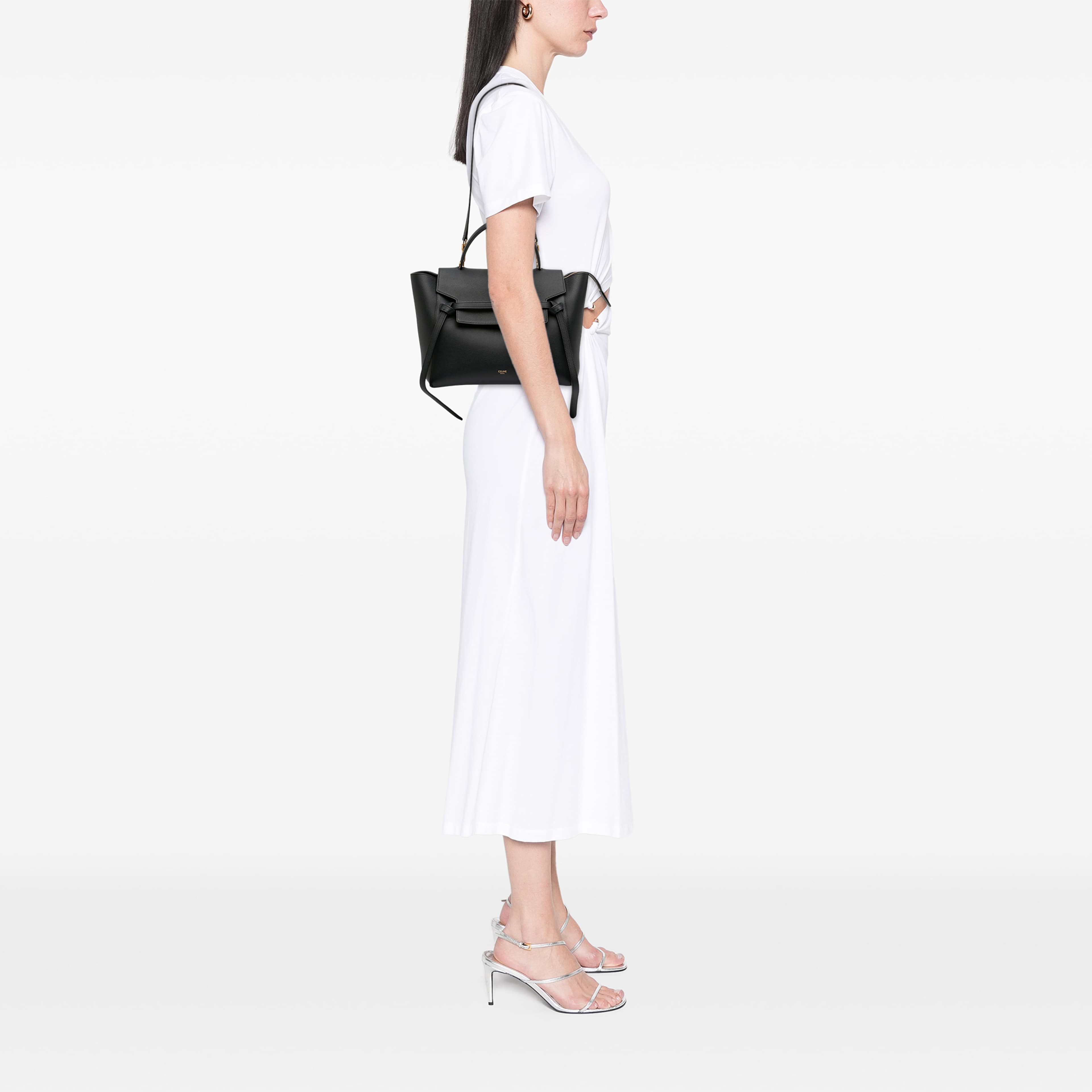 Celine Mini Grained Calfskin Belt Bag, från Luxclusif, i färgen svart. Klicka för att öppna bilden i stort format