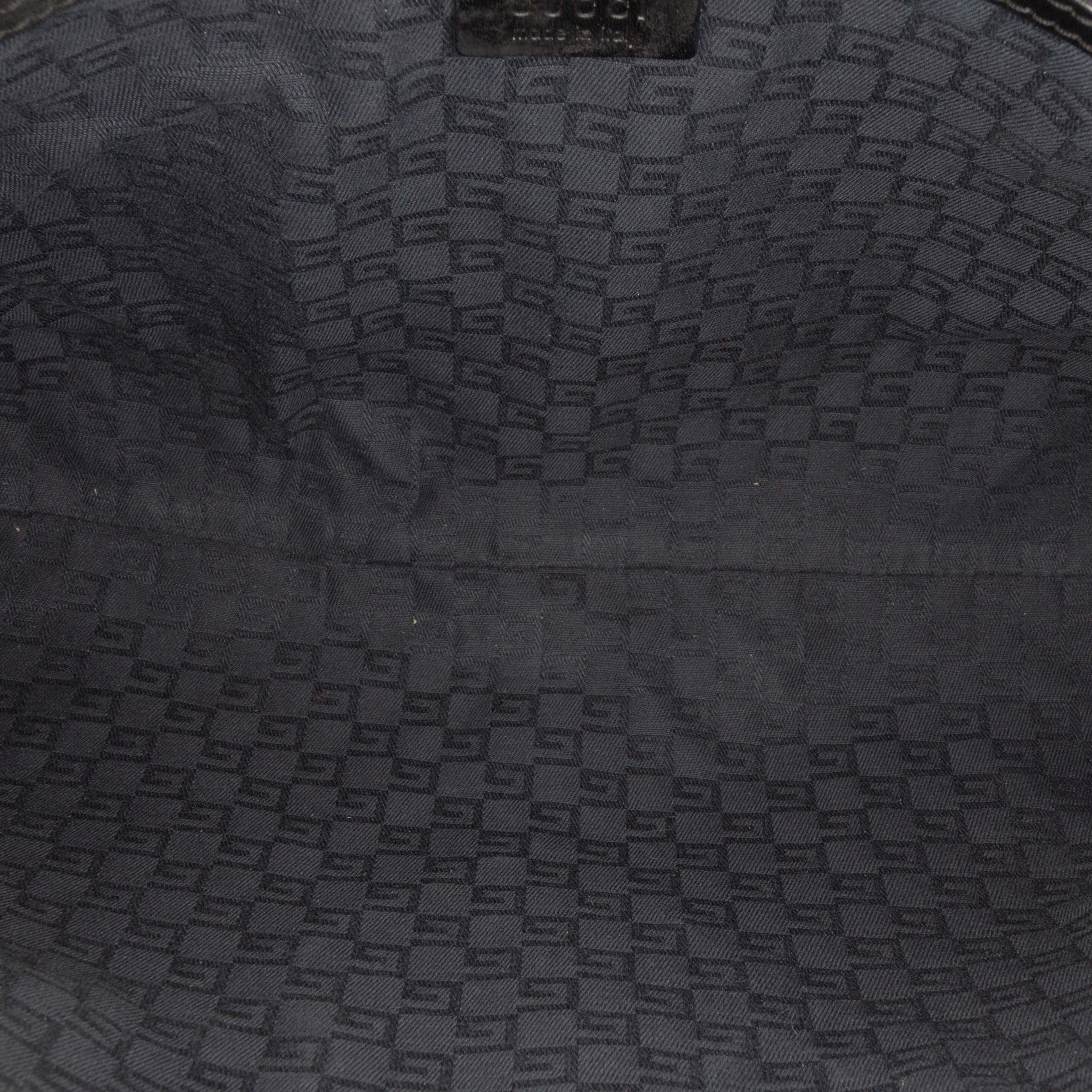 Gucci Canvas Reins Shoulder Bag, från Luxclusif, i färgen black. Klicka för att öppna bilden i stort format