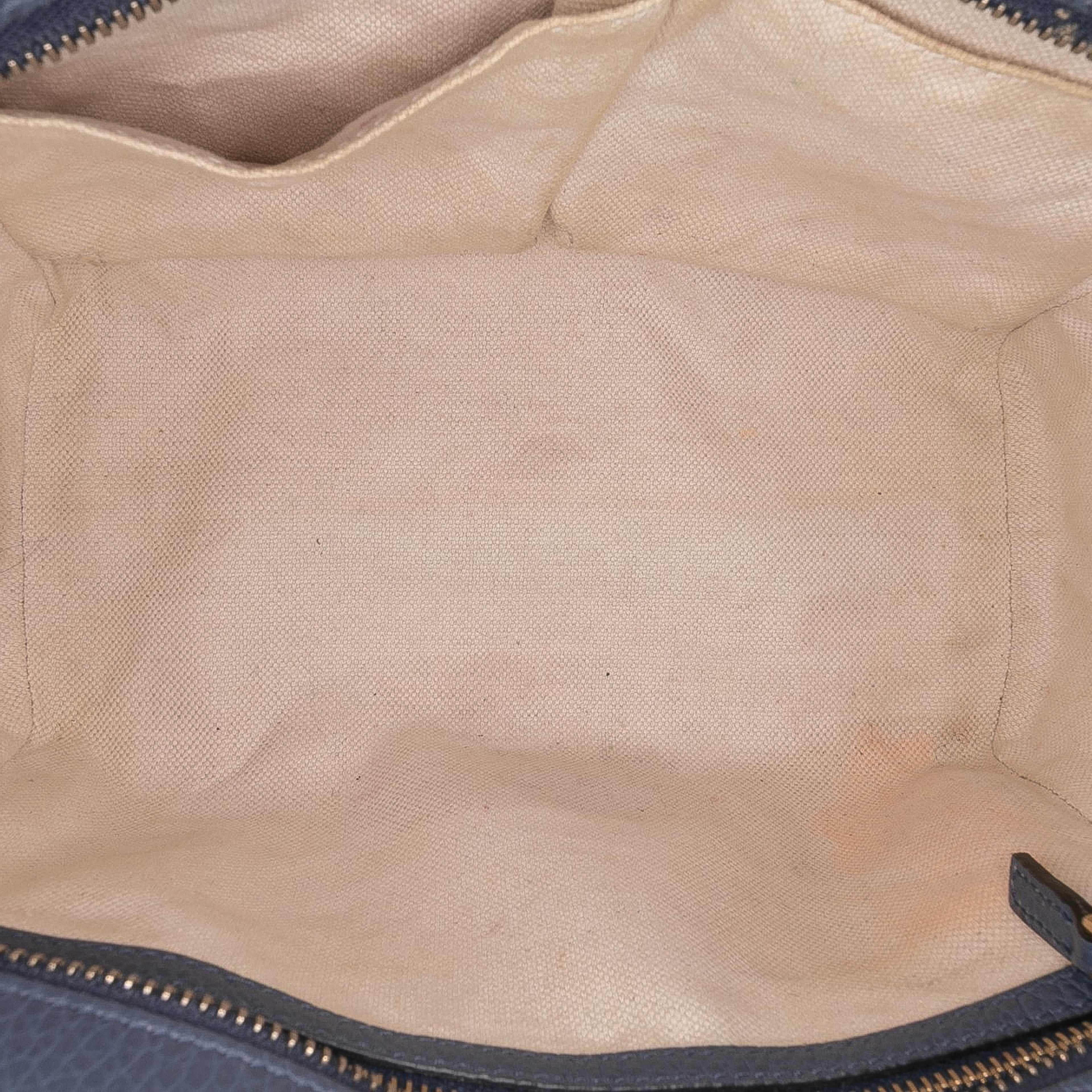 Gucci Mini Leather Swing Satchel, från Luxclusif, i färgen navy.