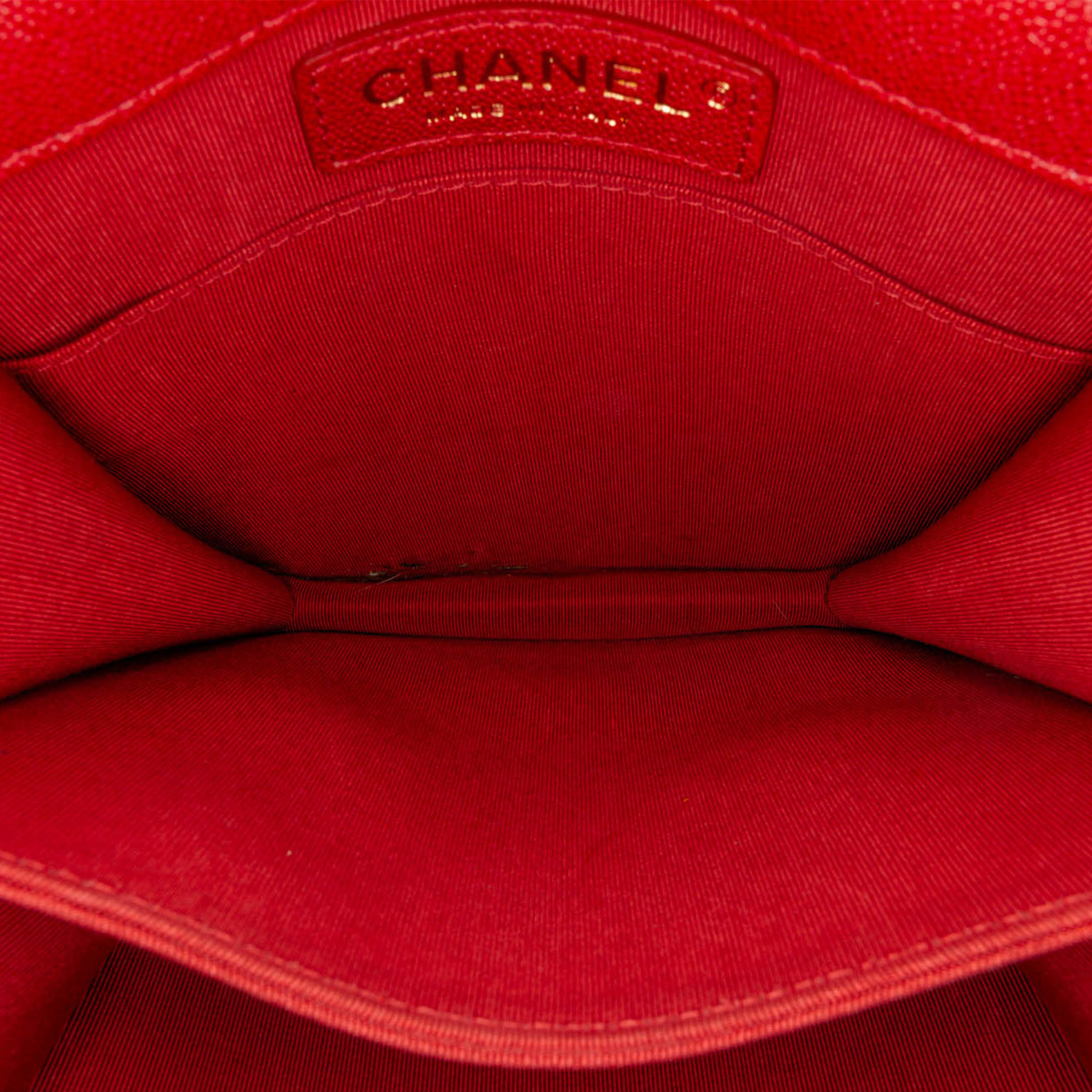 Chanel Quilted Caviar North South Boy Flap