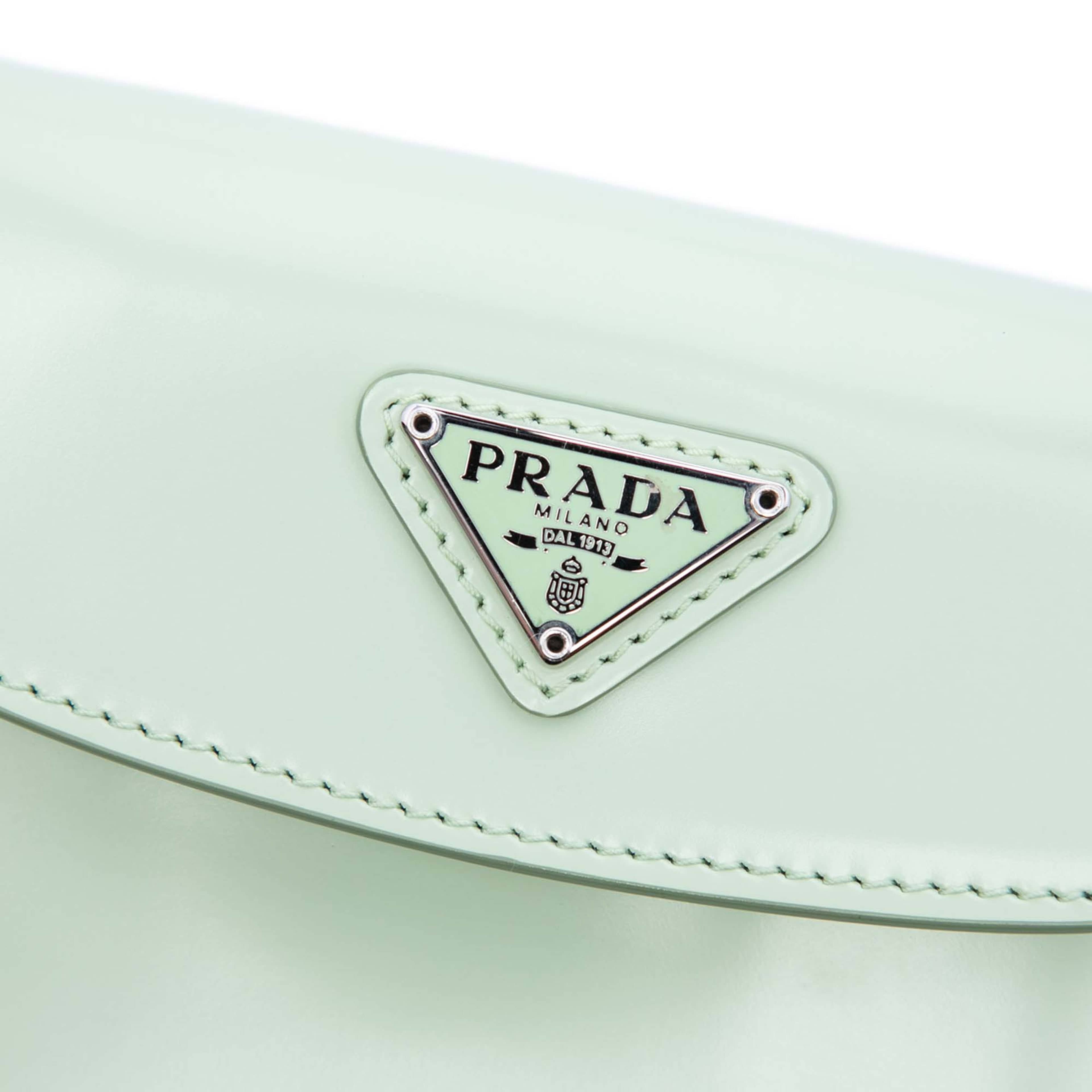 Prada Mini Brushed Leather Cleo Bag, från Luxclusif, i färgen light green. Klicka för att öppna bilden i stort format