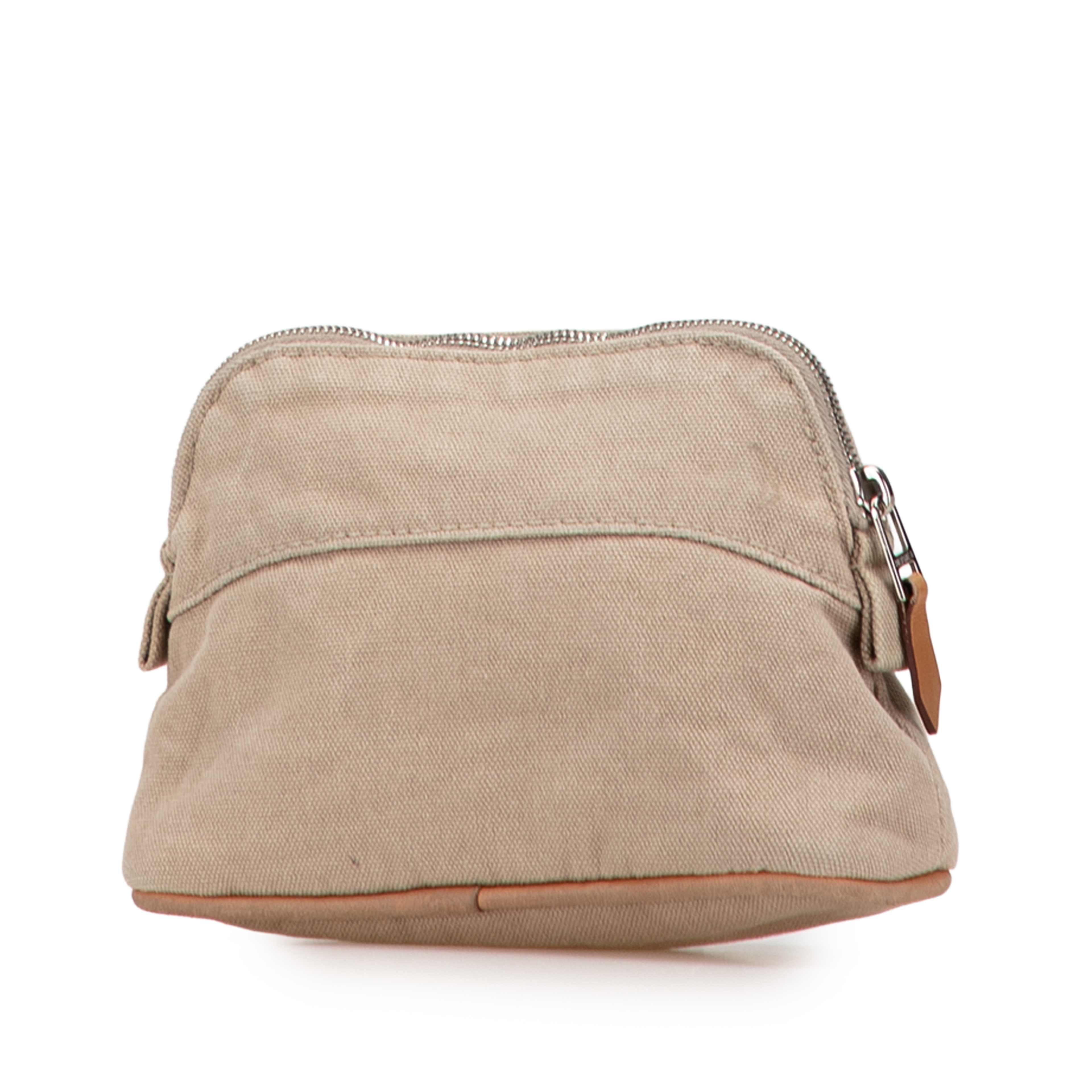 Hermès Mini Canvas Bolide Case, från Luxclusif, i färgen beige. Klicka för att öppna bilden i stort format