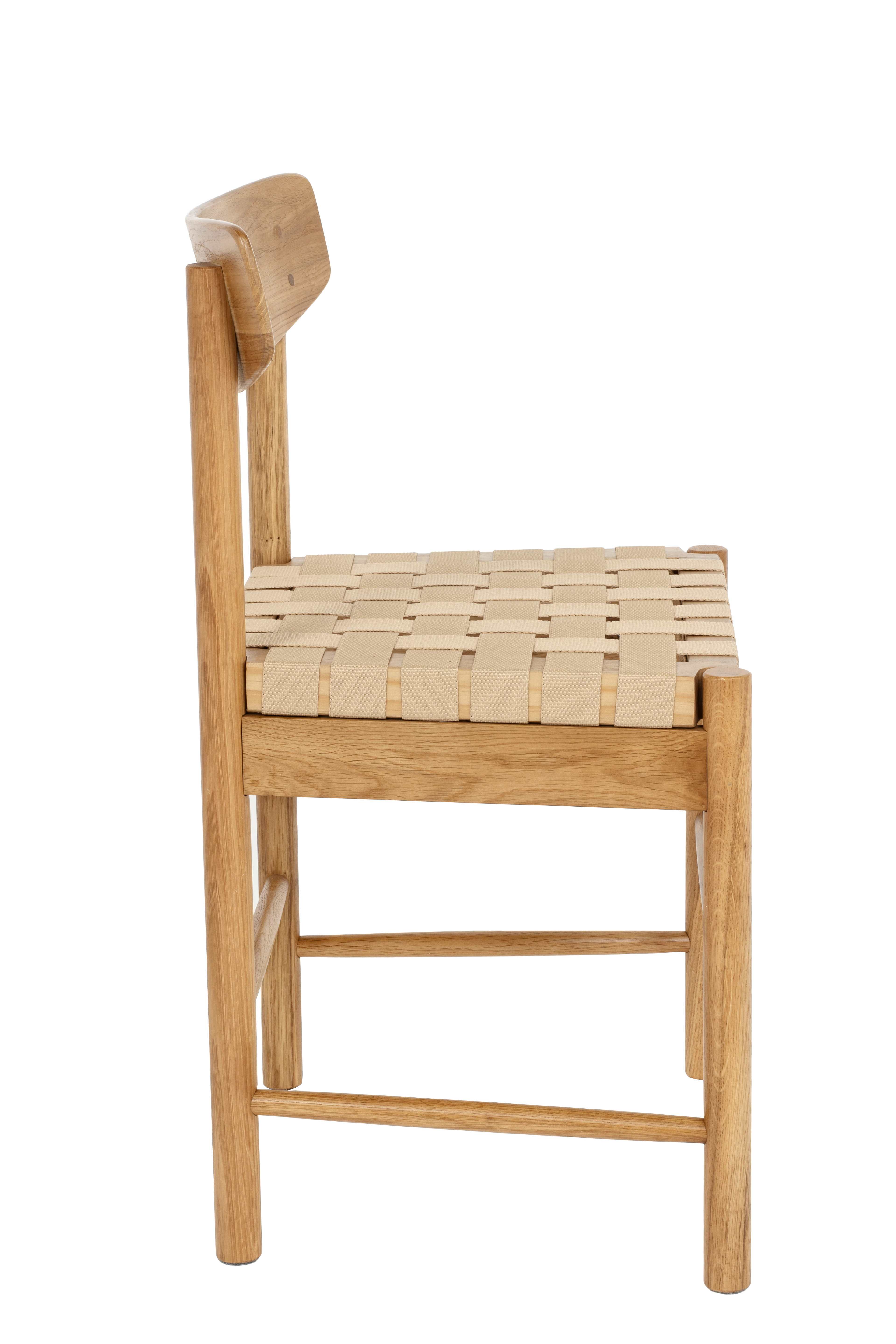 Matstol med flätad sits i sadelgjord ALMA, från Åhléns Home, i färgen Oak. Klicka för att öppna bilden i stort format