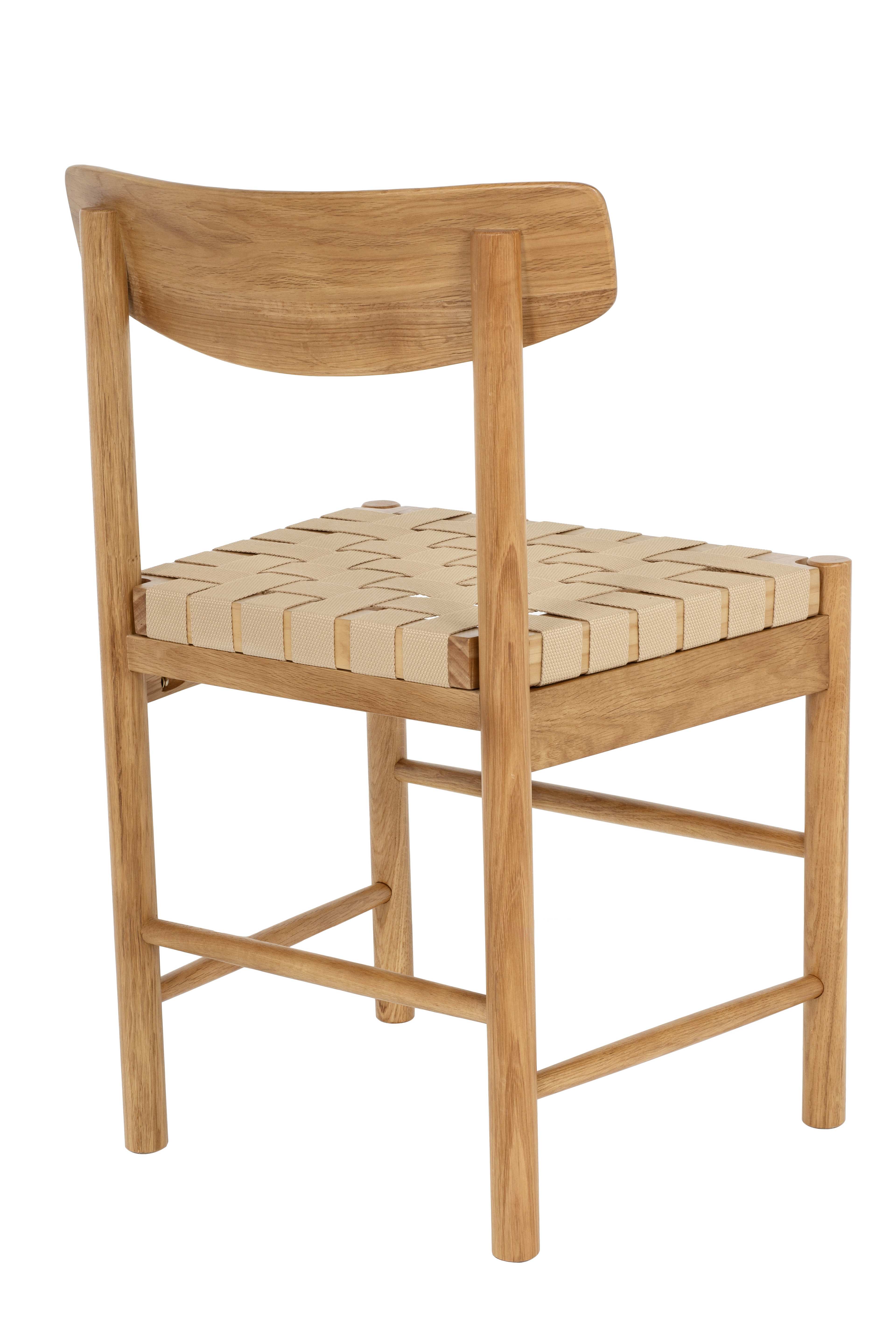 Matstol med flätad sits i sadelgjord ALMA, från Åhléns Home, i färgen Oak. Klicka för att öppna bilden i stort format