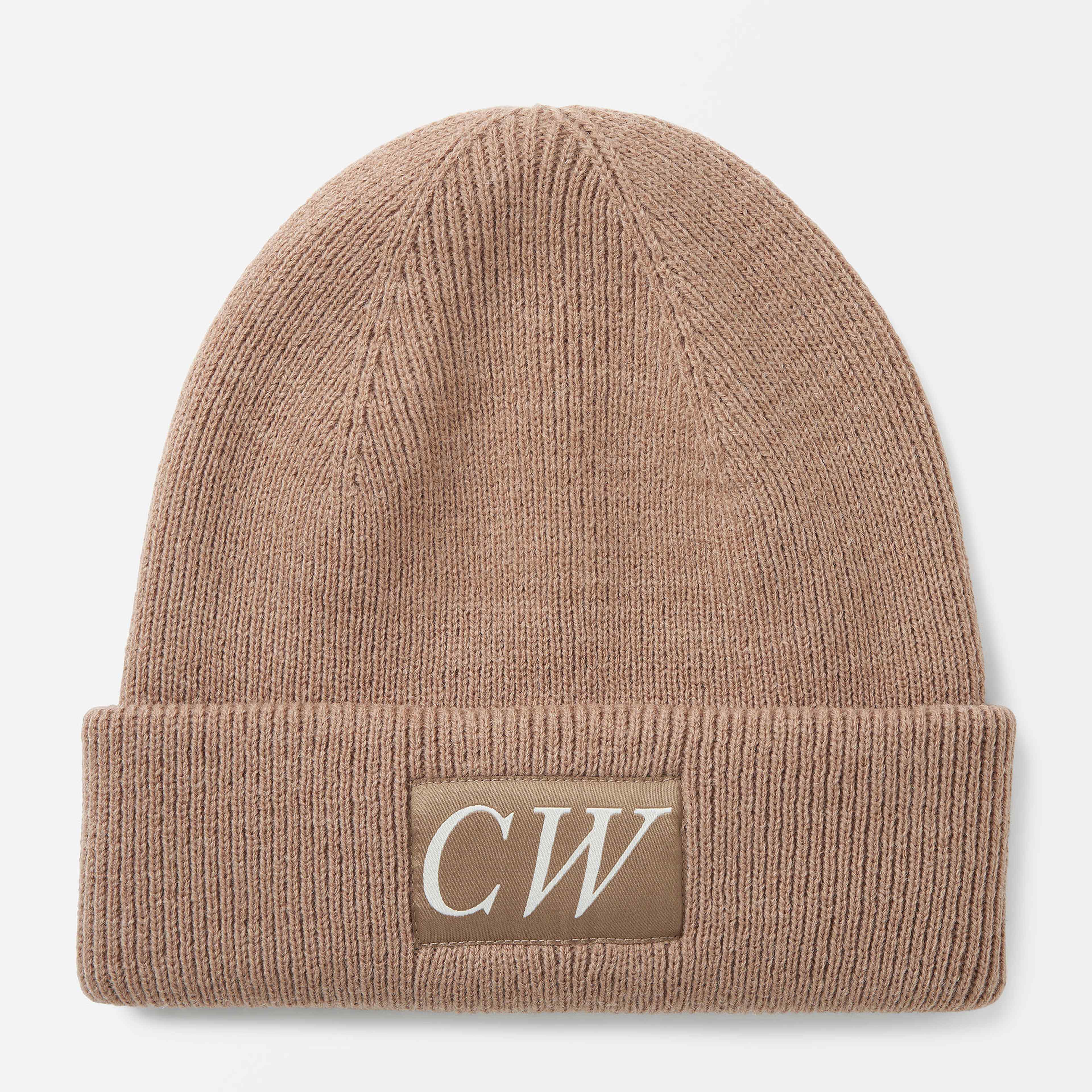 Beanie Jacquard Logo, från Carin Wester, i färgen Beige Melange 1. Klicka för att öppna bilden i stort format