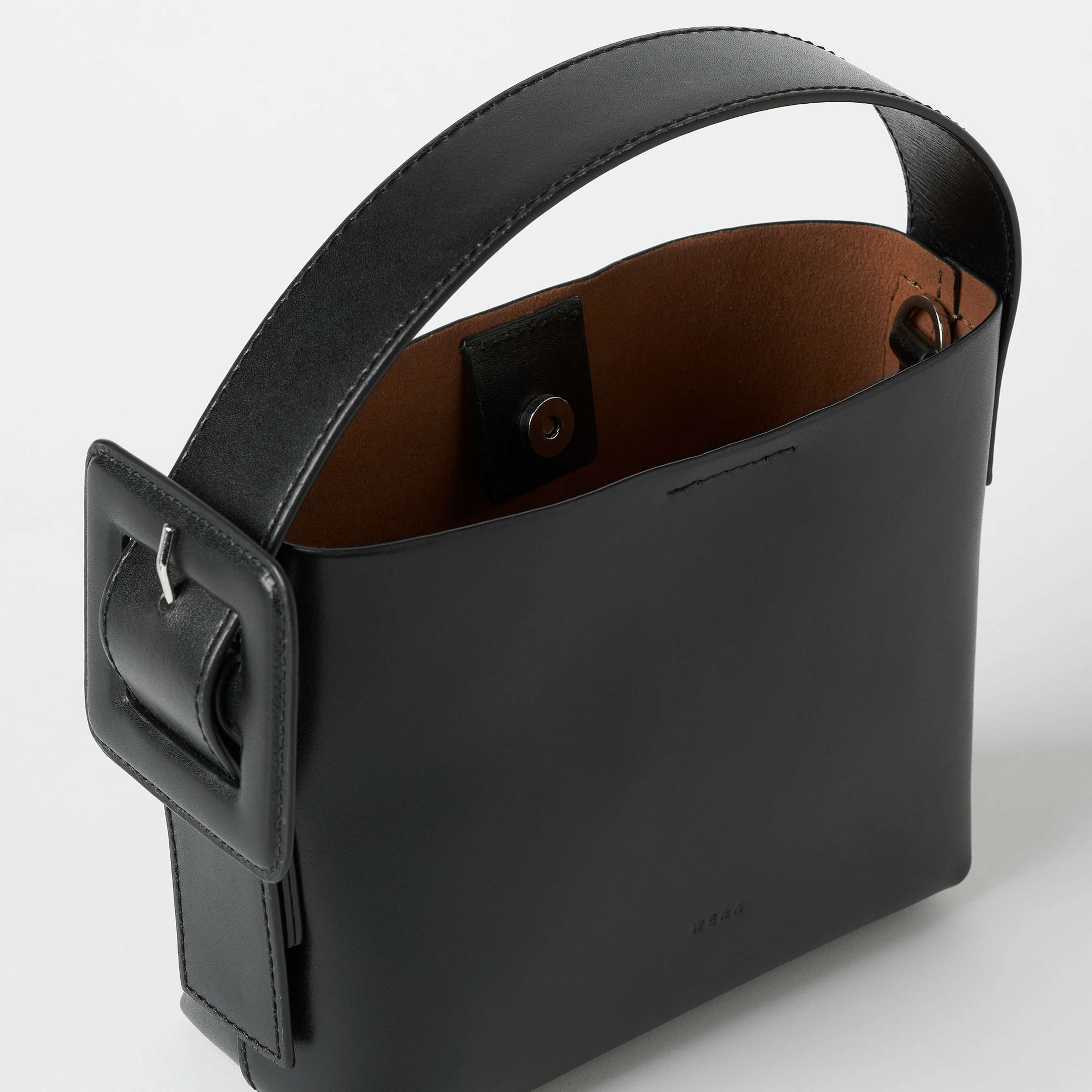 Crossbodyväska i läder IRIS