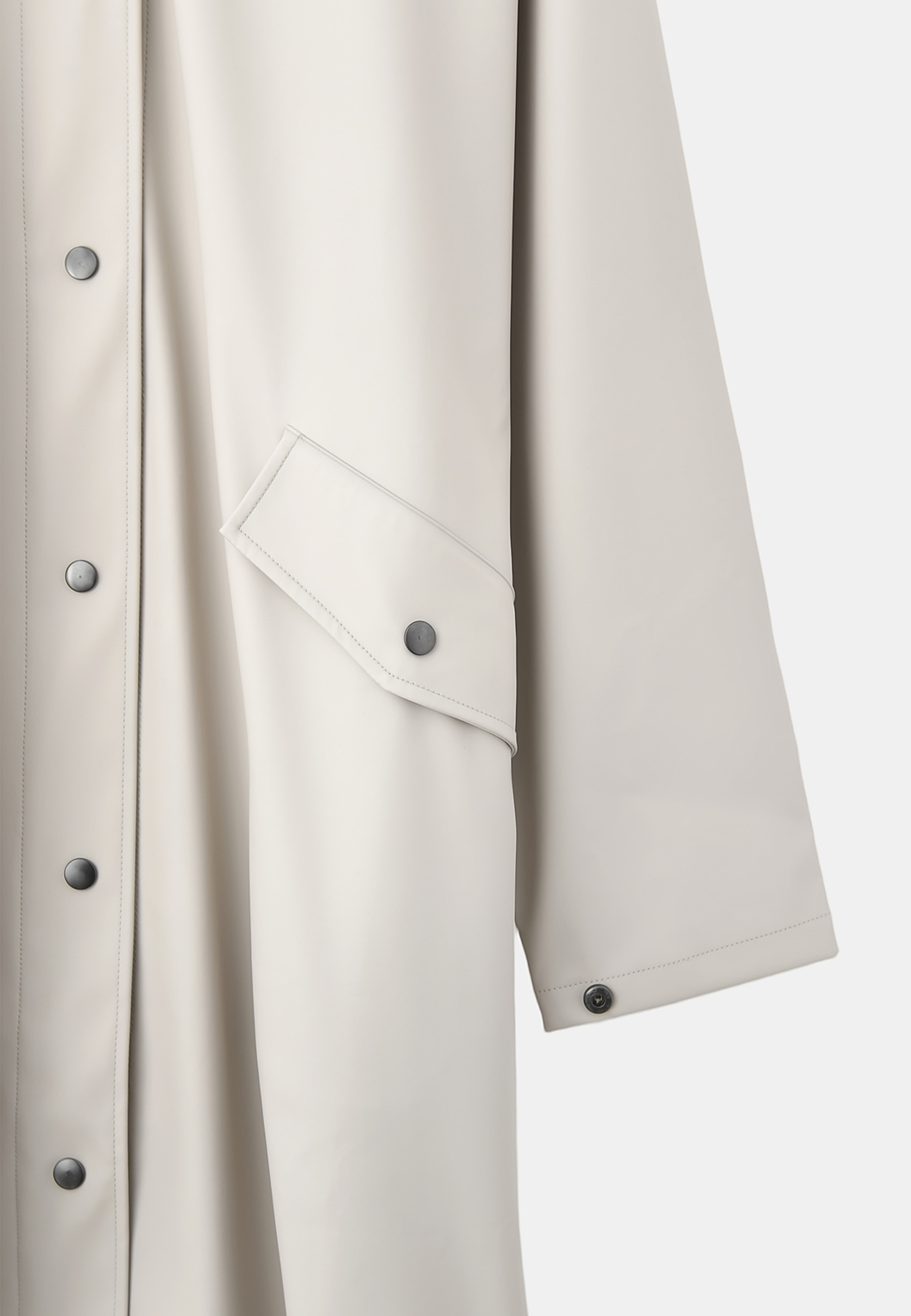 Regnjacka HEAVEN, från Å WOMAN, i färgen Beige. Klicka för att öppna bilden i stort format