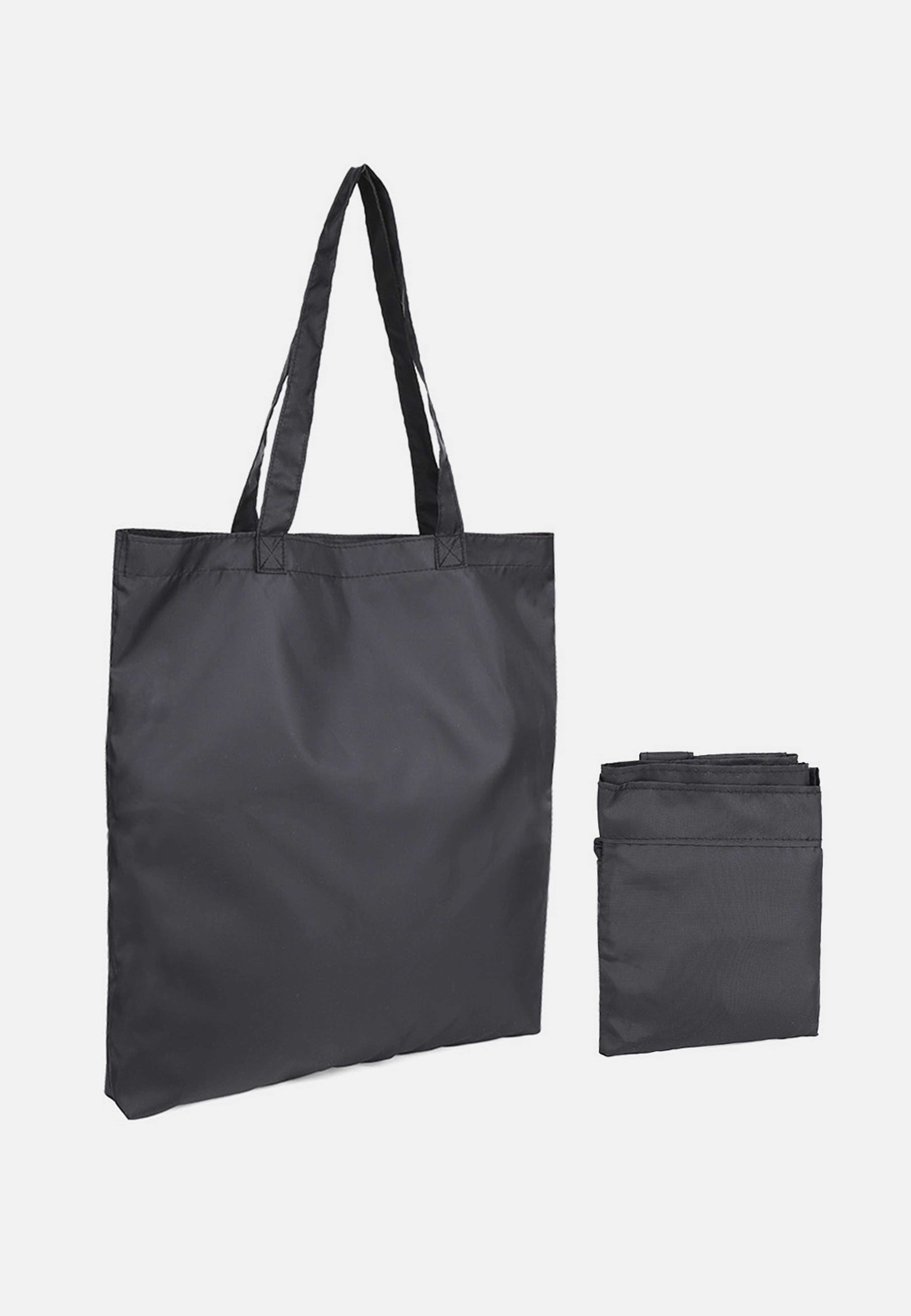 Hopvikbar shoppingpåse MIA, från Å WOMAN, i färgen Black. Klicka för att öppna bilden i stort format