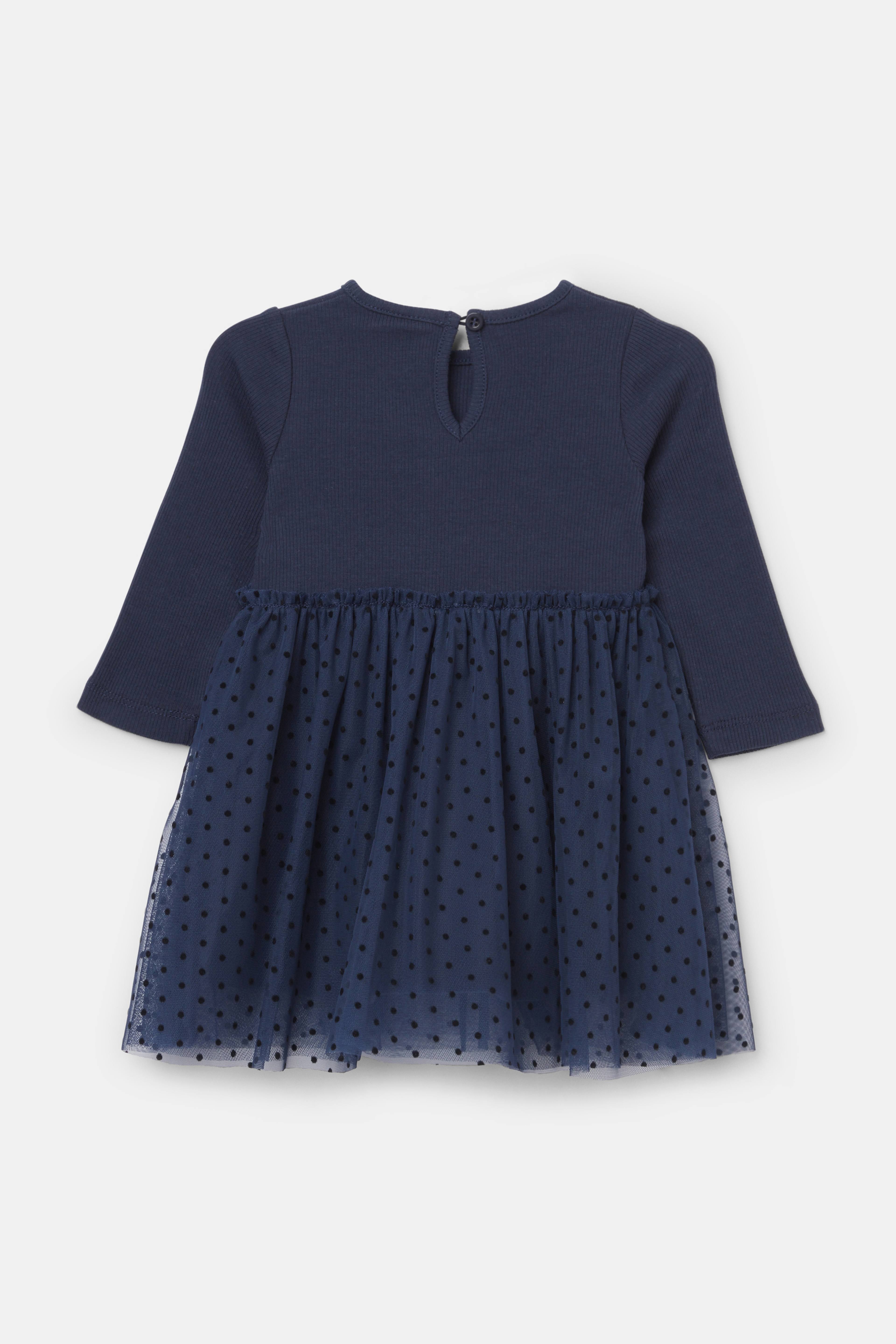 Ribbstickad klänning med tyll TANJA, från RIKIKI, i färgen Navy. Klicka för att öppna bilden i stort format