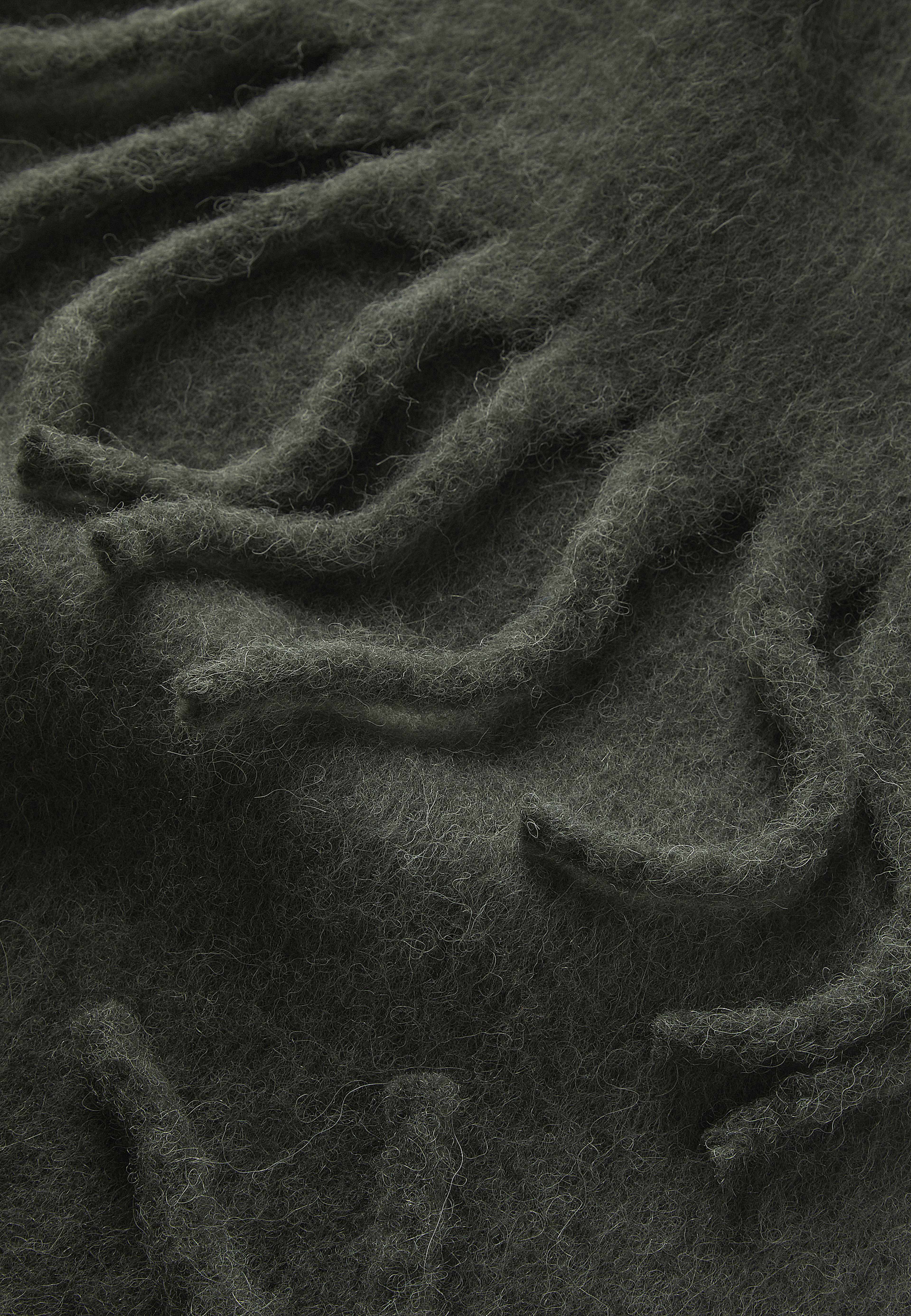 Enfärgad ullhalsduk MOSS, från Wera, i färgen Dark Green. Klicka för att öppna bilden i stort format