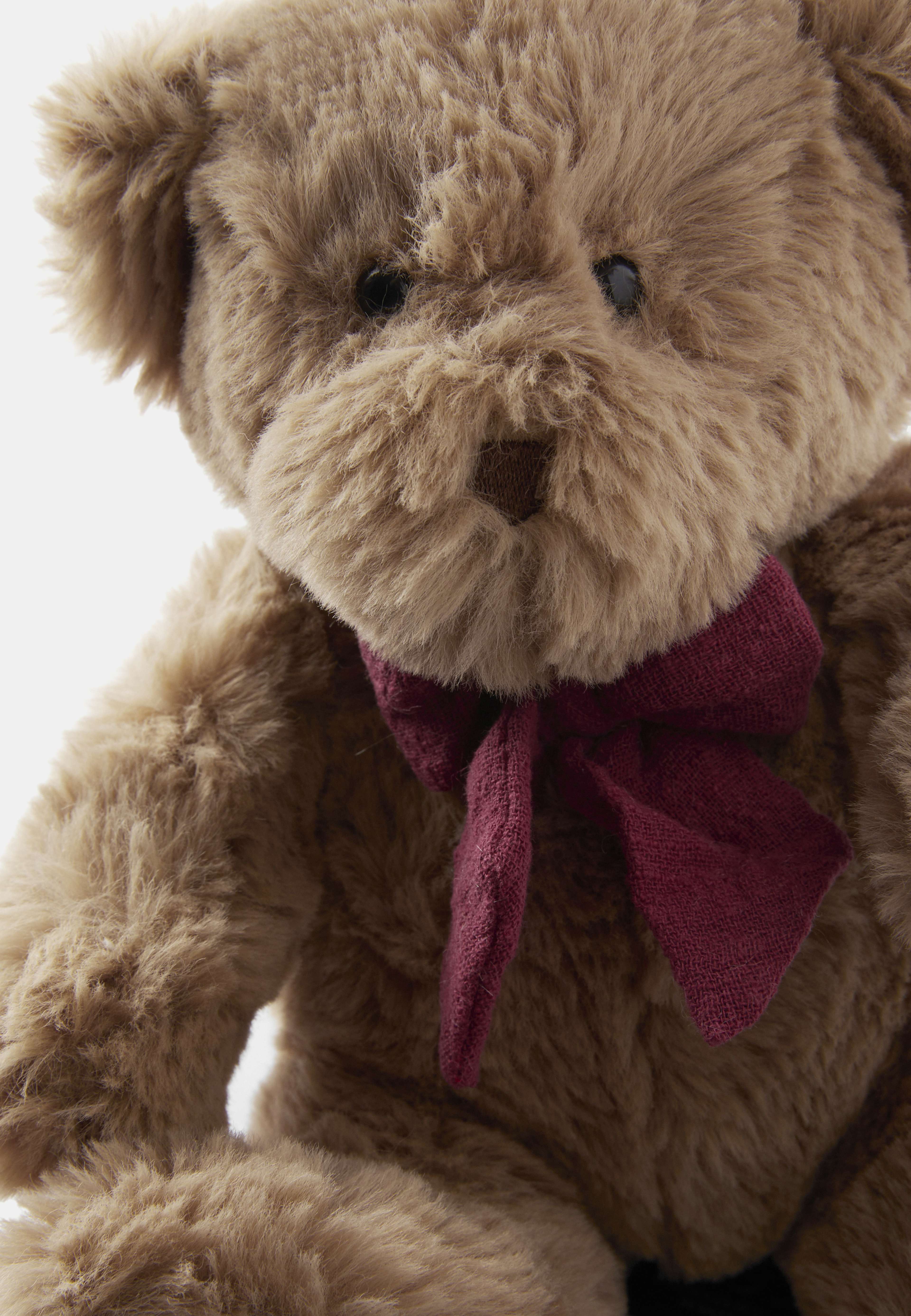 Gosedjur teddybjörn med fluga