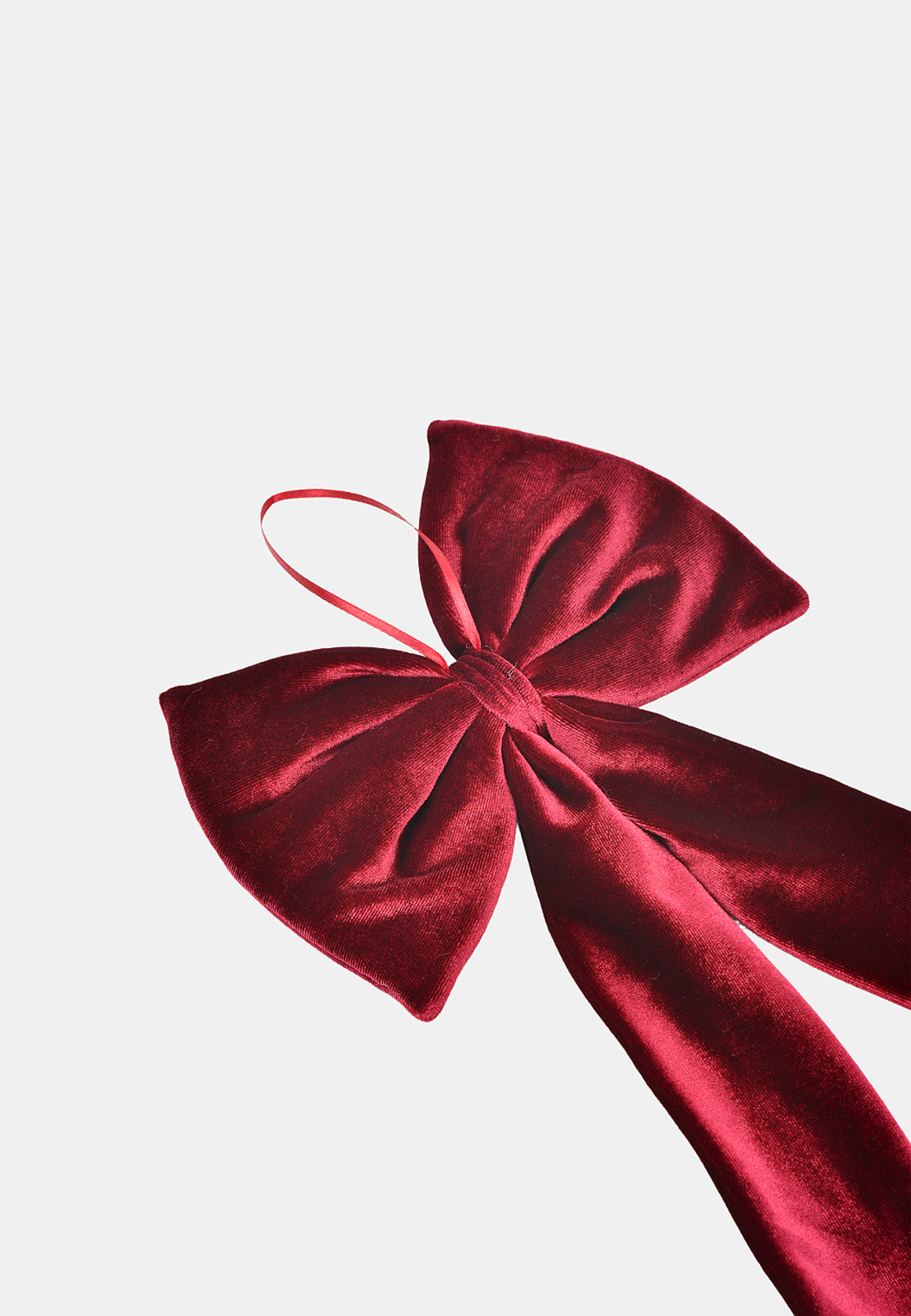 Sammetsrosett BOW 18x30 cm, från Åhléns Home, i färgen Dark Red. Klicka för att öppna bilden i stort format