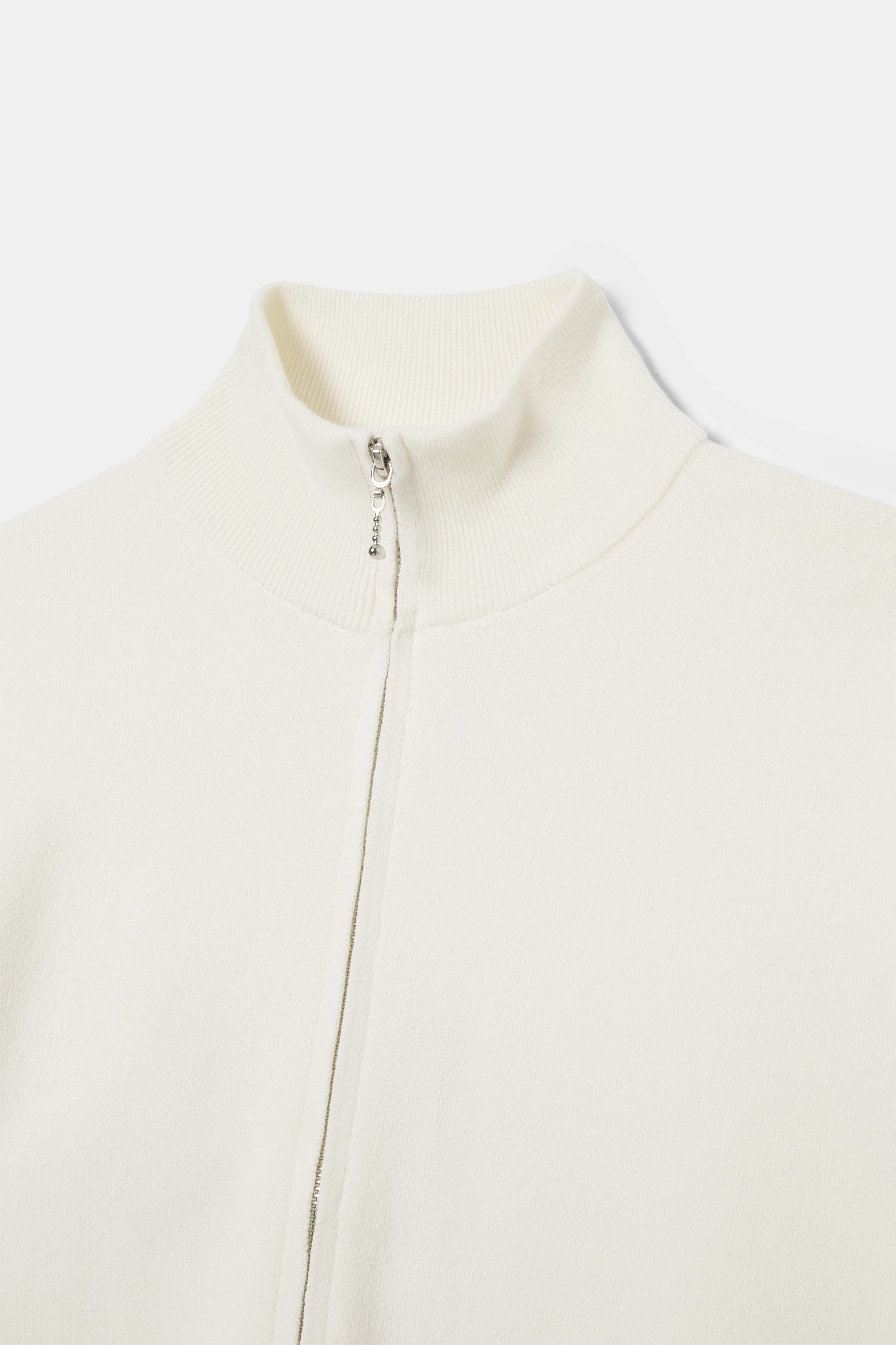 Cardigan EIVOR, från Å WOMAN, i färgen Creme. Klicka för att öppna bilden i stort format