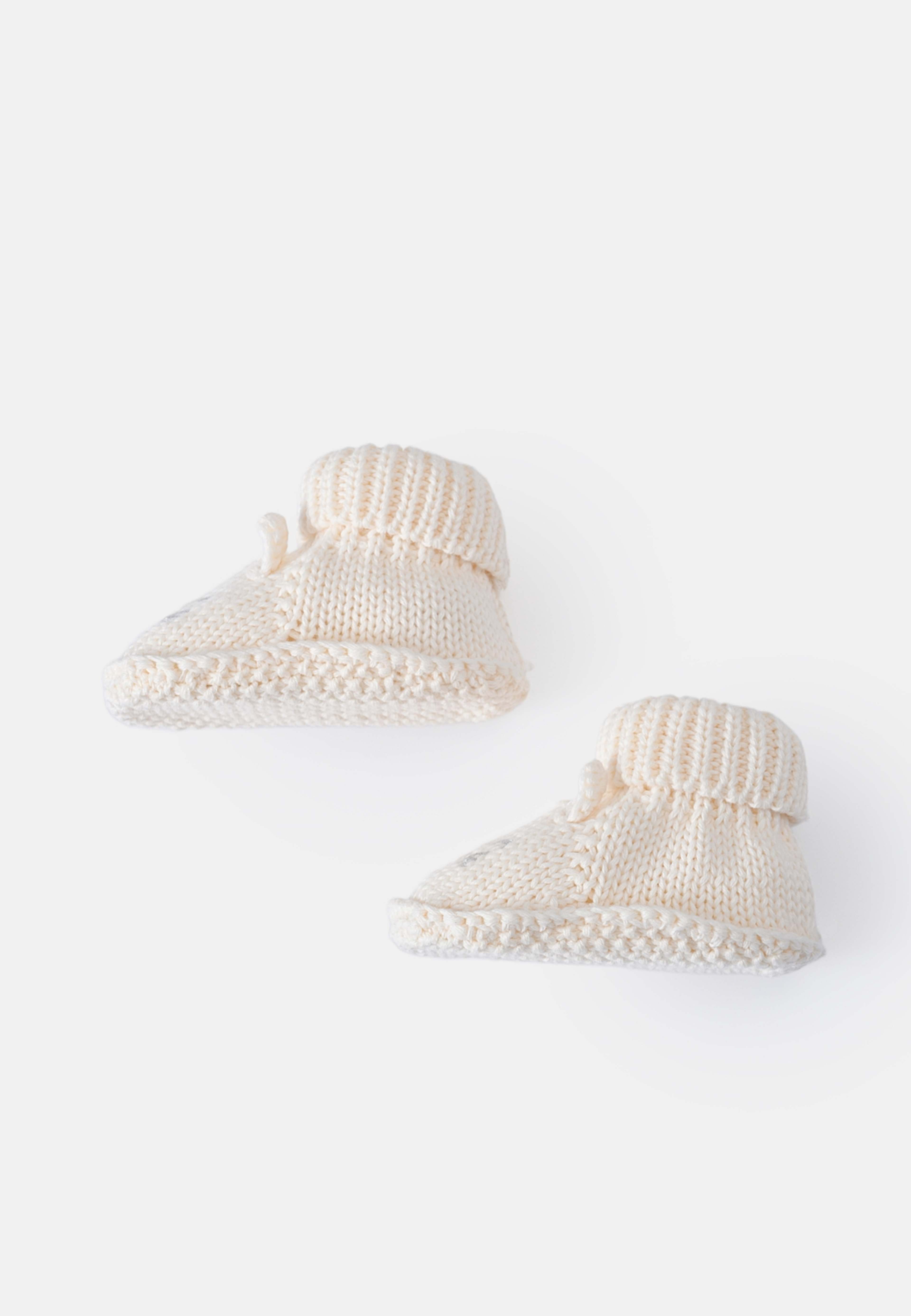 Stickade tossor SWAN, från RIKIKI, i färgen Bunny Darling. Klicka för att öppna bilden i stort format