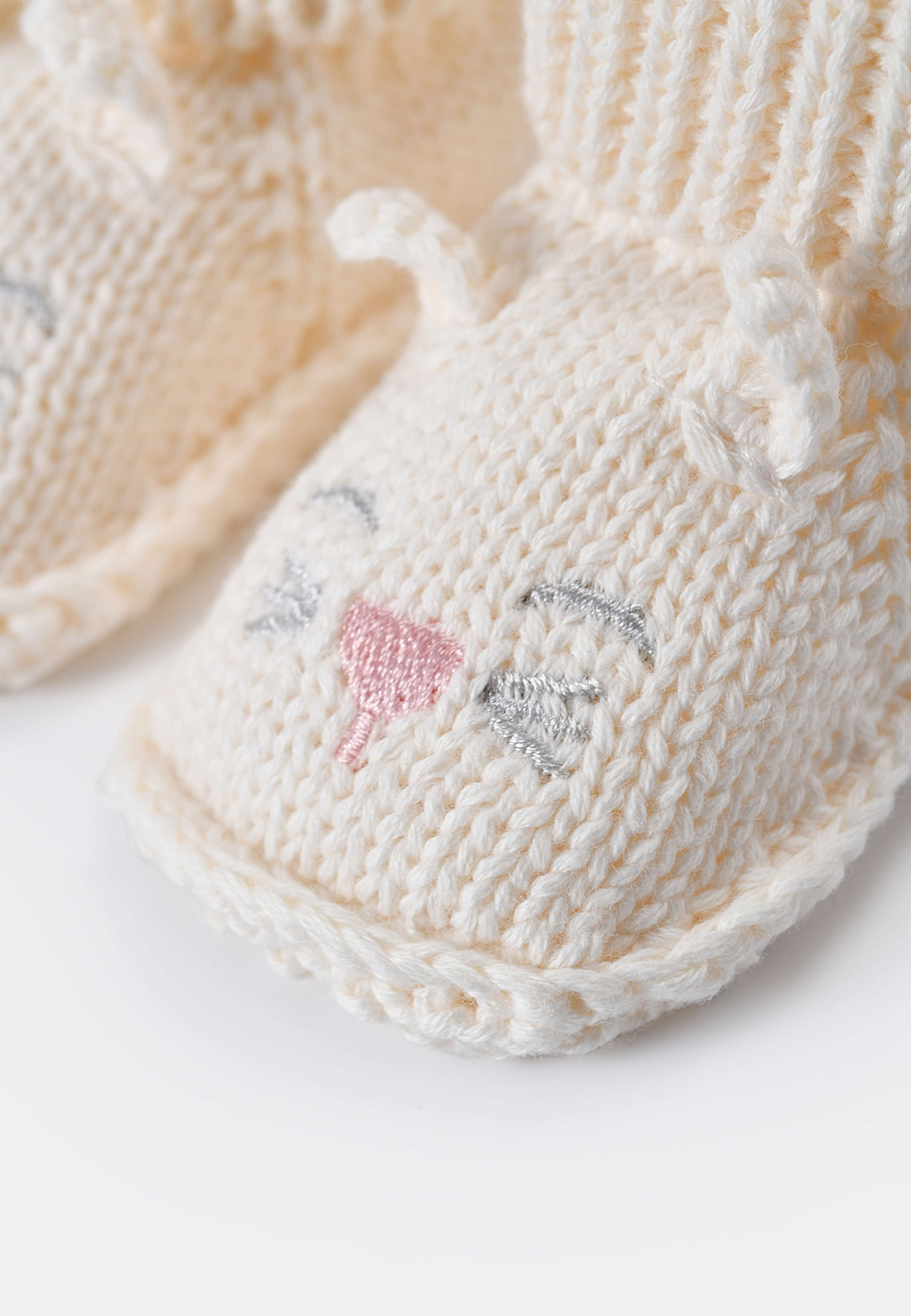 Stickade tossor SWAN, från RIKIKI, i färgen Bunny Darling. Klicka för att öppna bilden i stort format