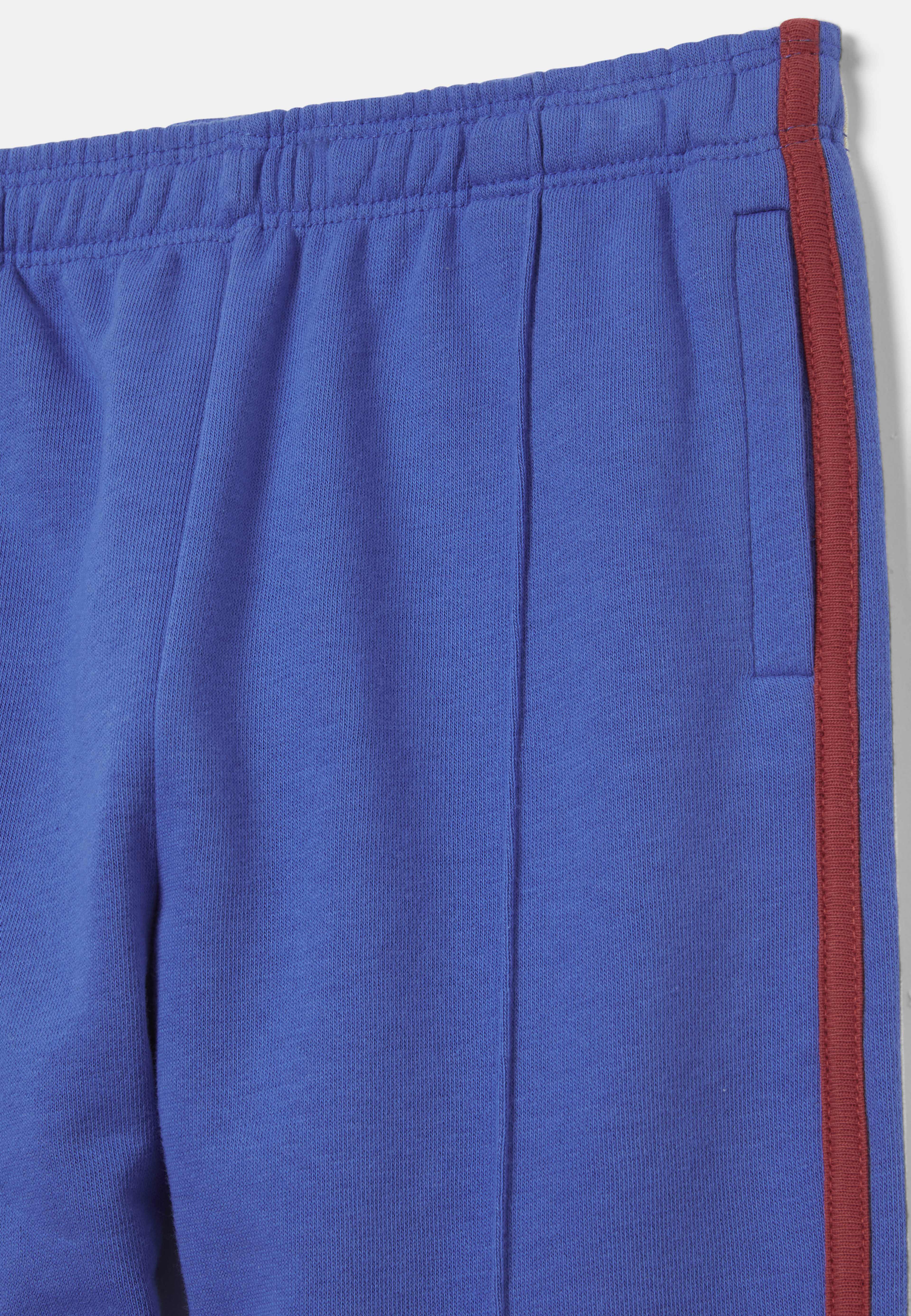 Tracksuitbyxor TRAVIS, från RIKIKI, i färgen Blue. Klicka för att öppna bilden i stort format