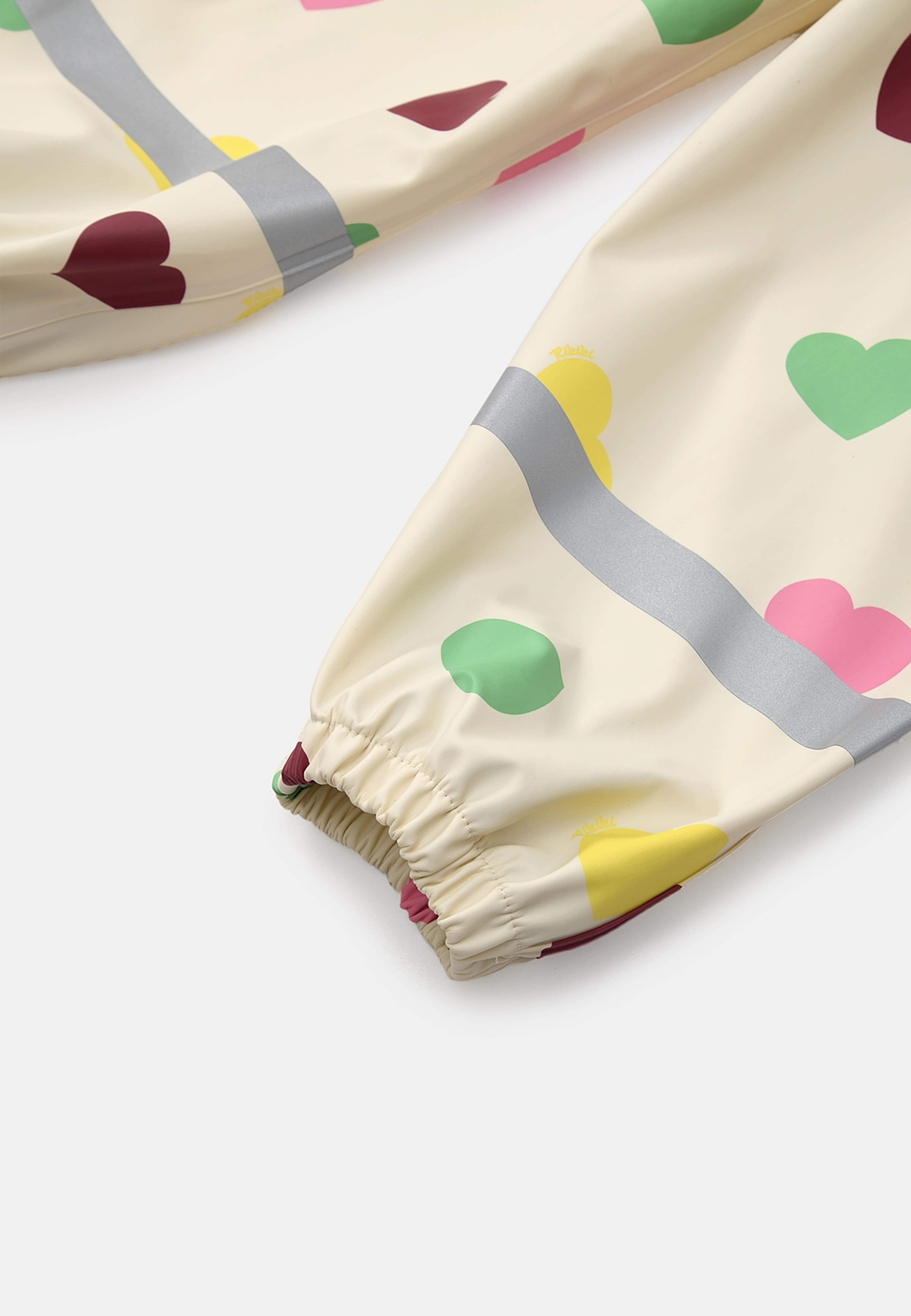 Regnbyxa RIVER, från RIKIKI, i färgen Love. Klicka för att öppna bilden i stort format