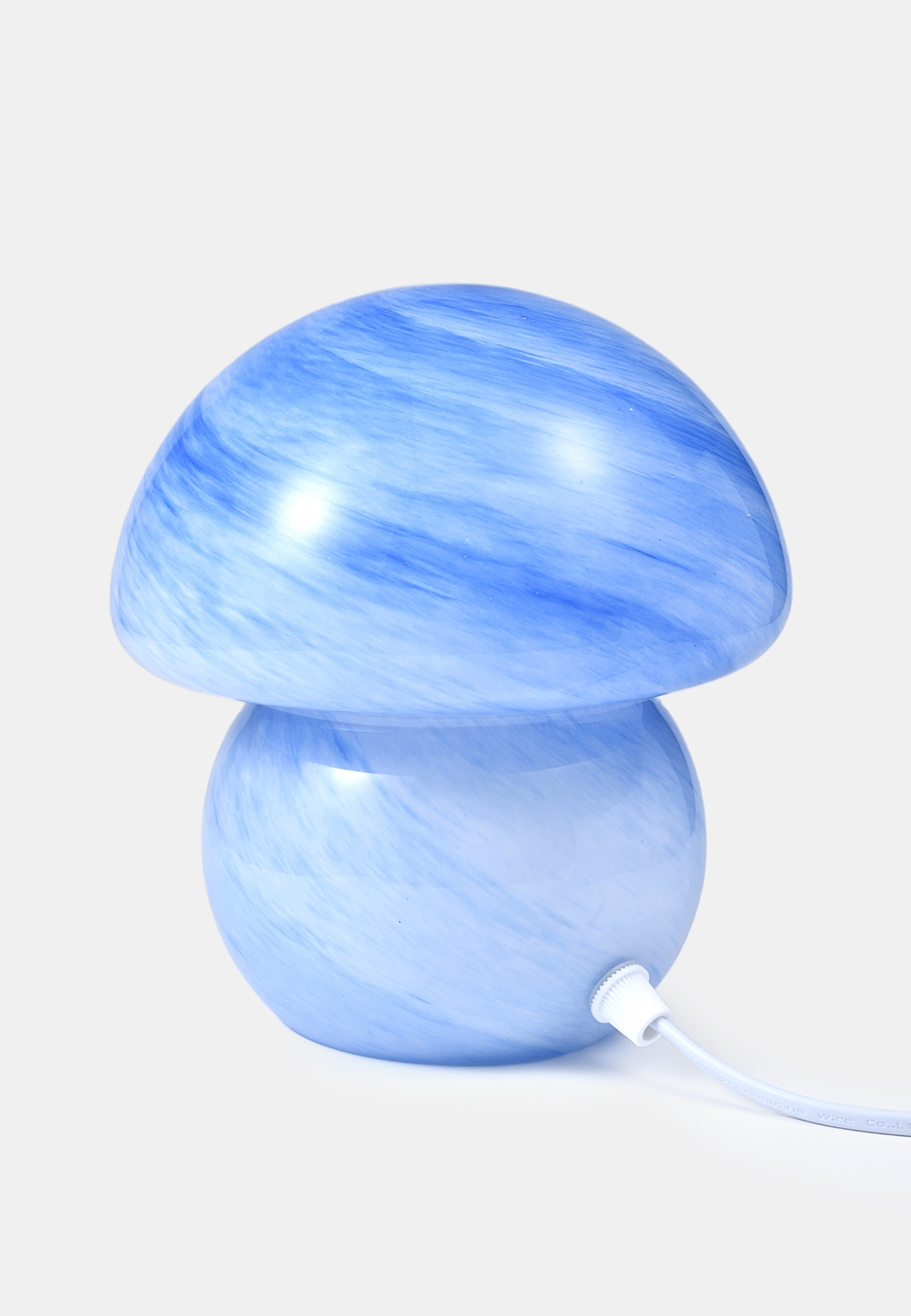 Bordslampa SVANTE, från Åhléns Home, i färgen Blue Swirl. Klicka för att öppna bilden i stort format