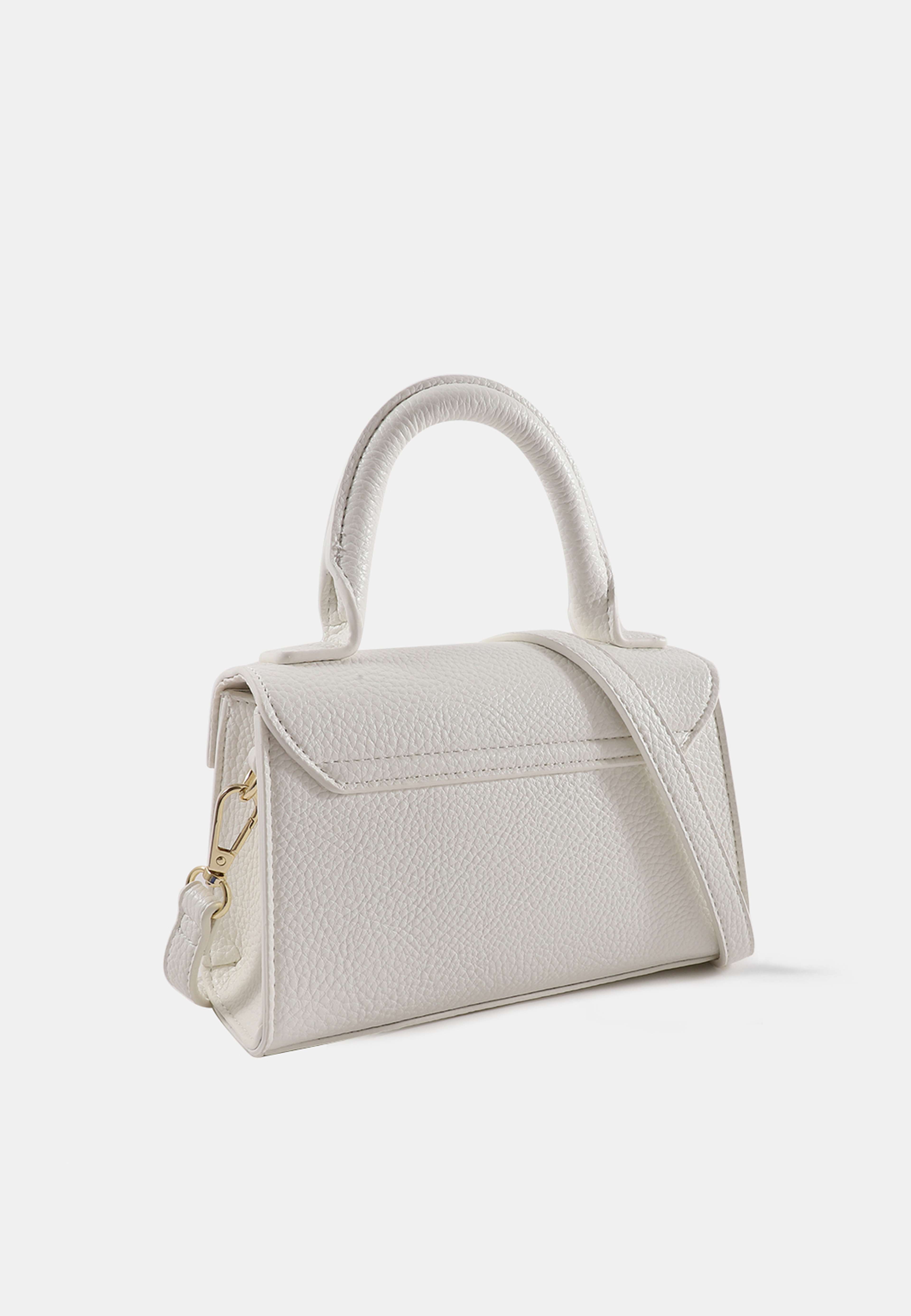 Handväska mini LOVA, från Å WOMAN, i färgen Off White. Klicka för att öppna bilden i stort format