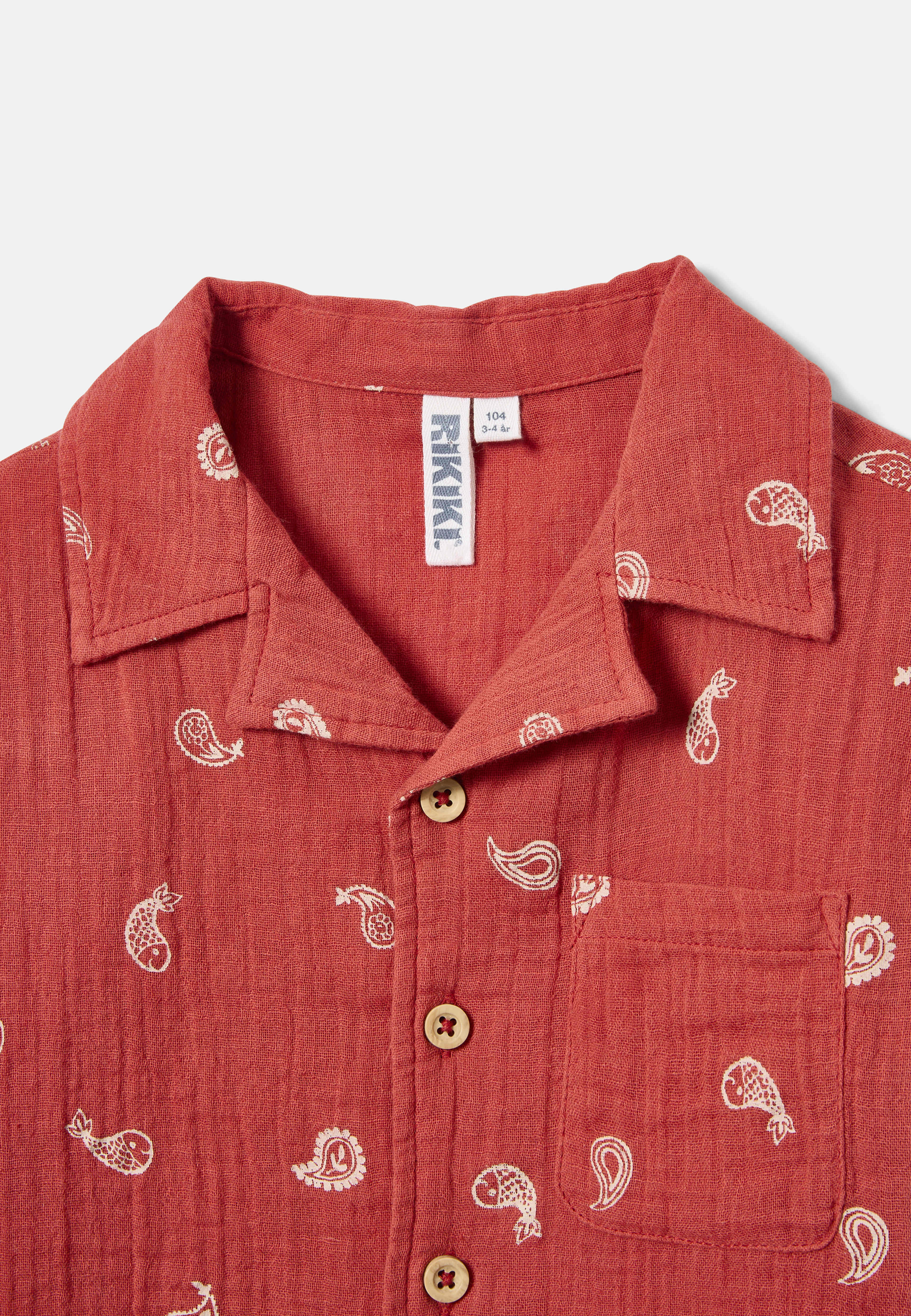 Krinklad skjorta IVY, från RIKIKI, i färgen Red. Klicka för att öppna bilden i stort format