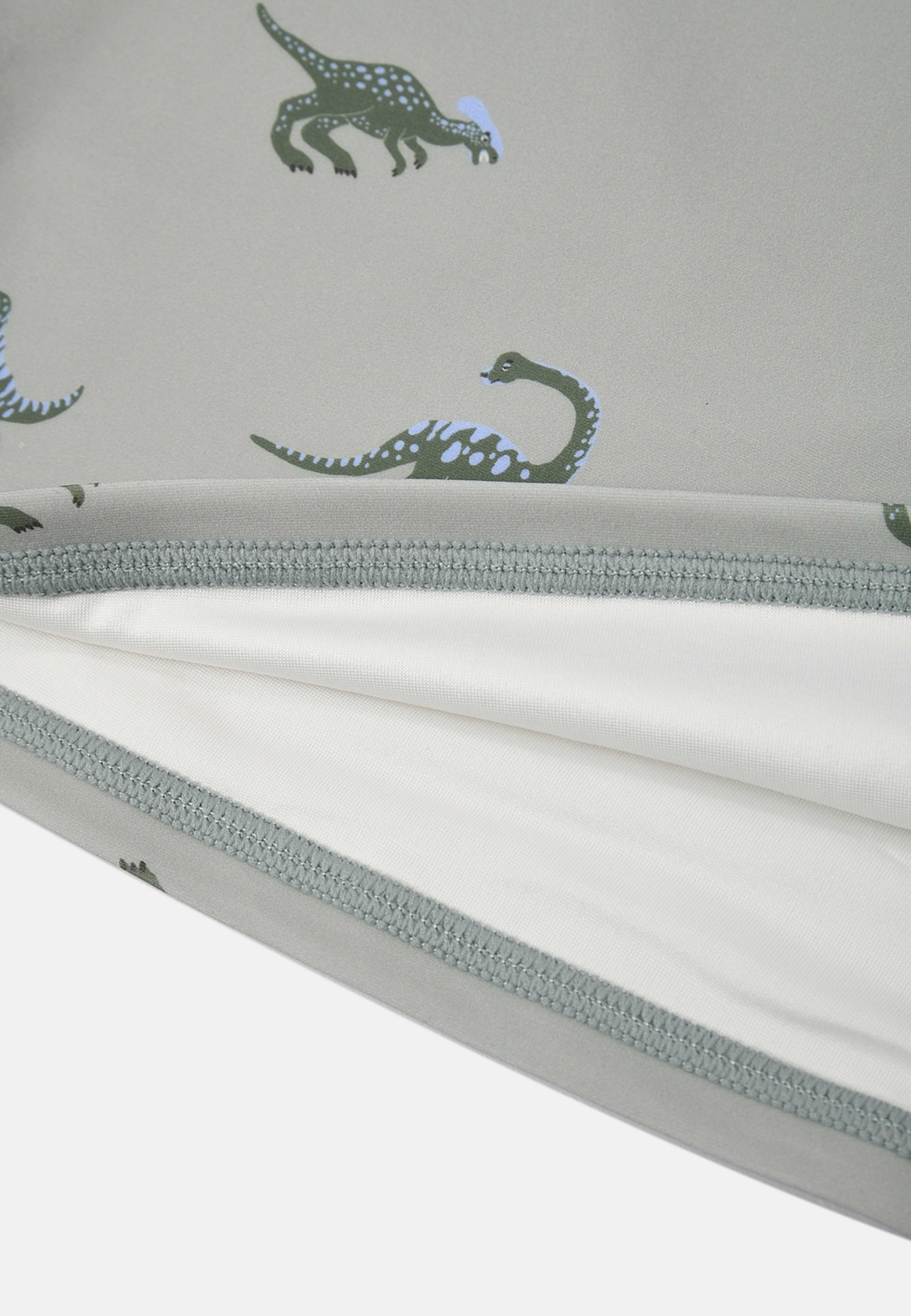 UV-set KERRY, från RIKIKI, i färgen Dino / Green. Klicka för att öppna bilden i stort format