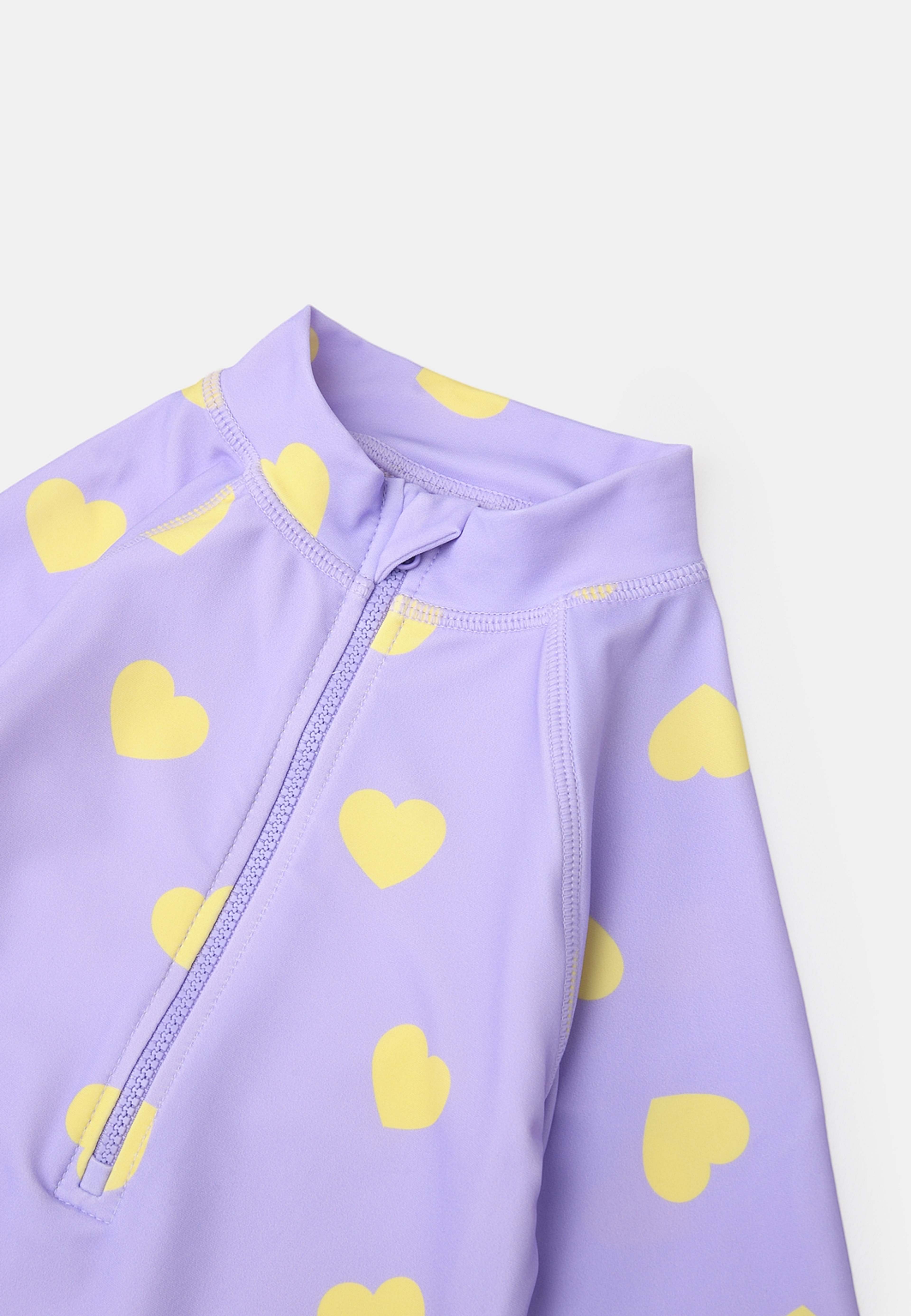 UV-baddräkt med lång ärm DAGNY, från RIKIKI, i färgen Purple Heart. Klicka för att öppna bilden i stort format