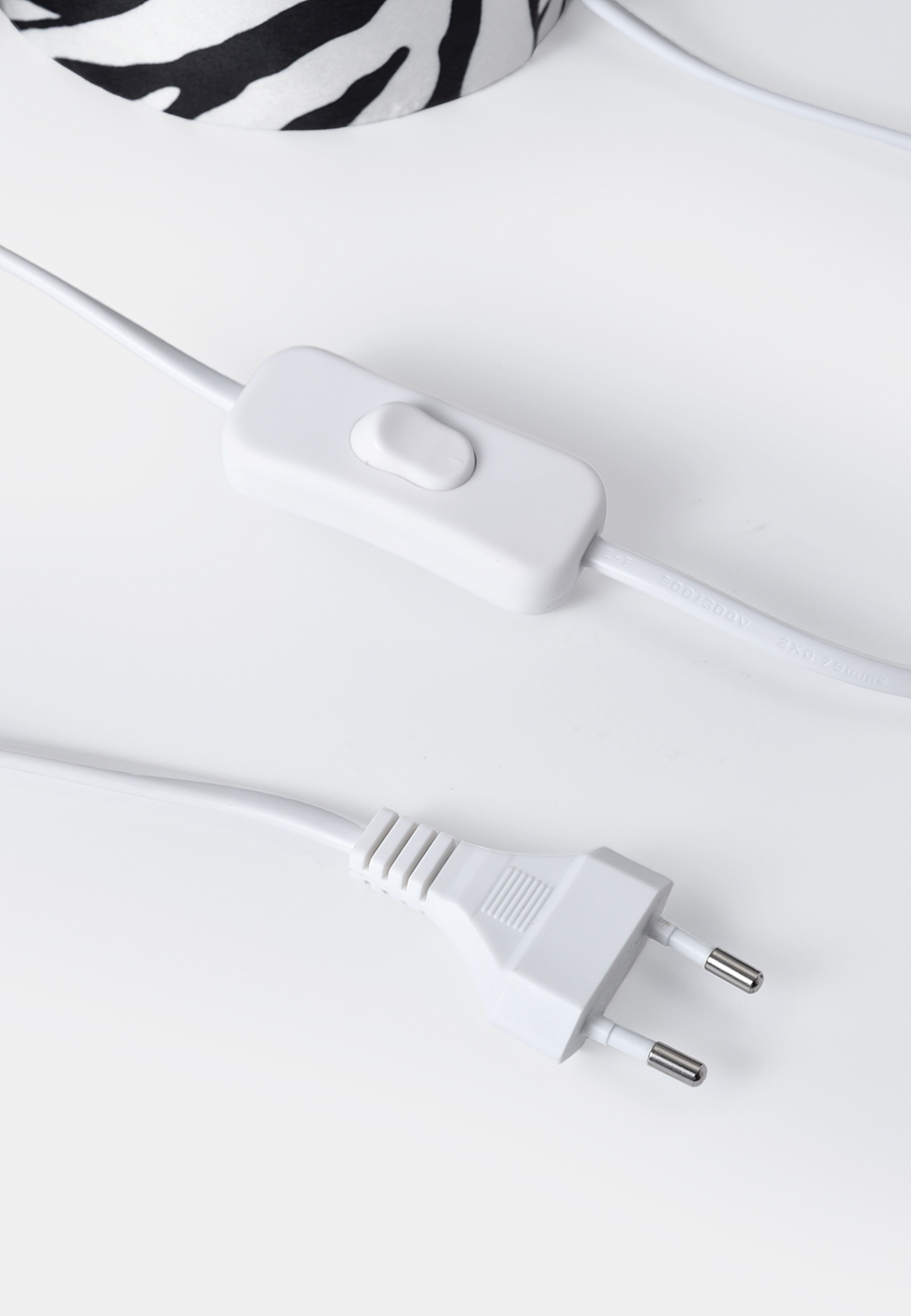 Bordslampa HANNE zebra, från Åhléns Home, i färgen White/Black. Klicka för att öppna bilden i stort format