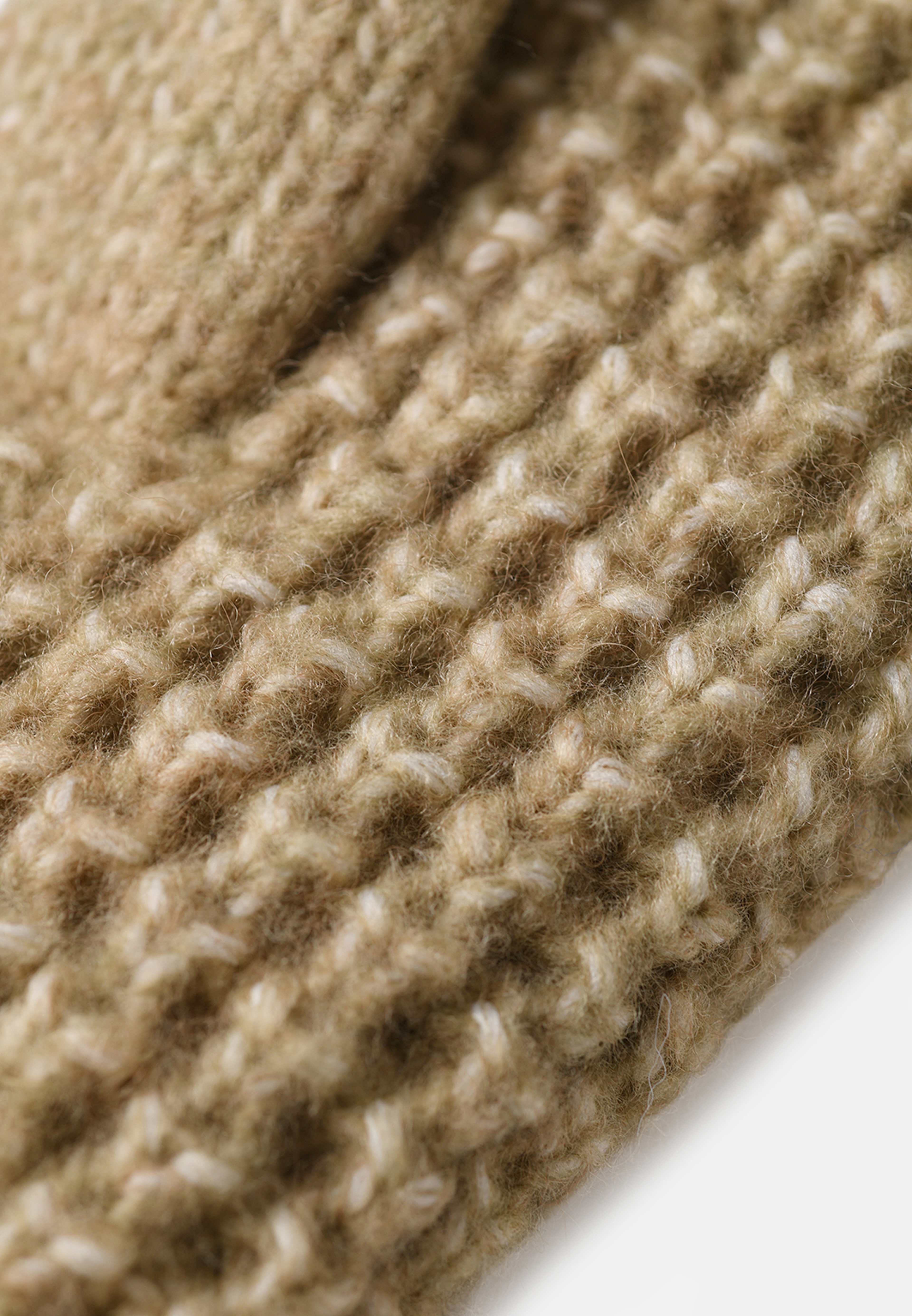 Stickade tumvantar CINA, från Å WOMAN, i färgen Beige Melange. Klicka för att öppna bilden i stort format