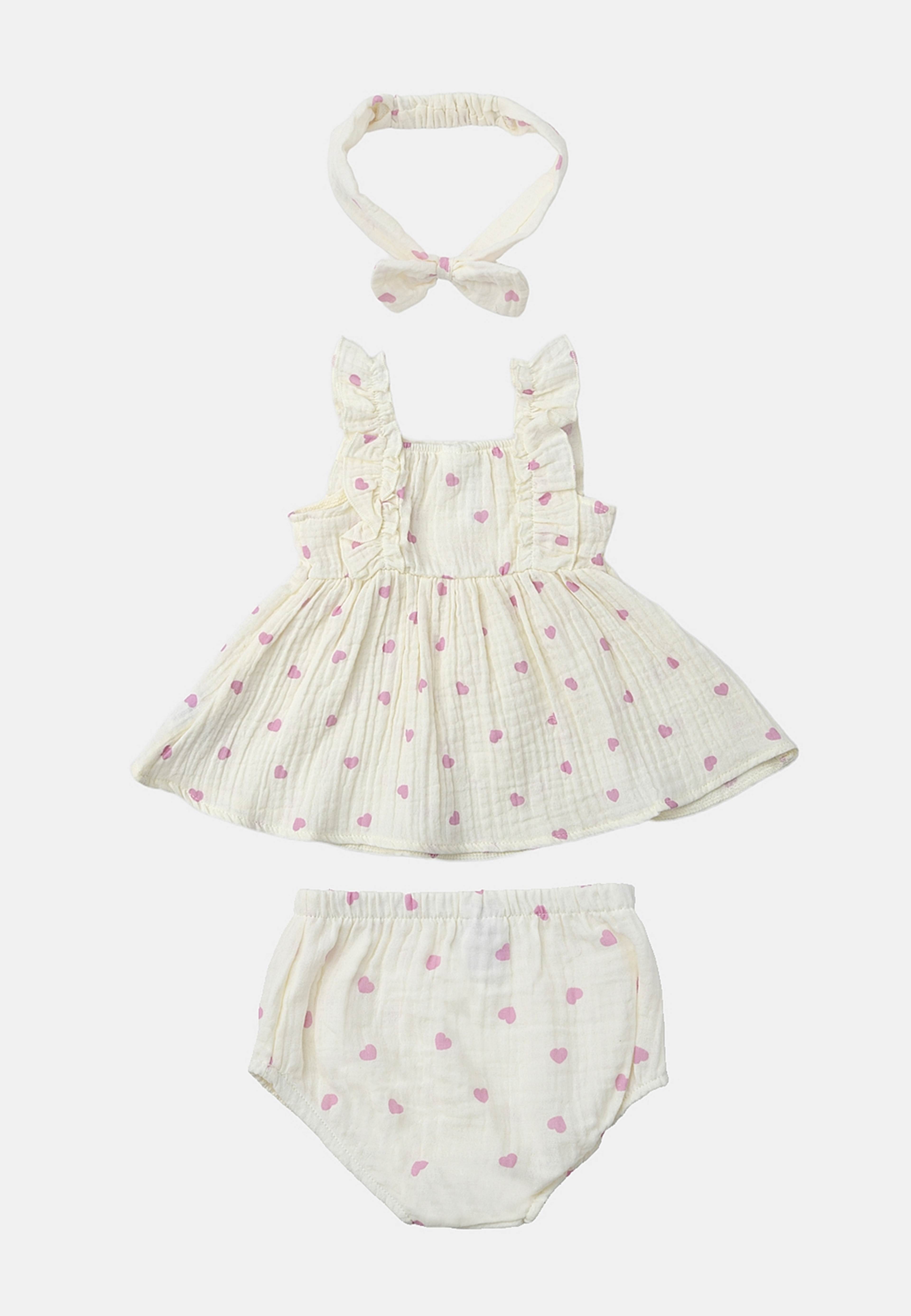 Krinklat klänningset NILLA, från RIKIKI, i färgen Heart. Klicka för att öppna bilden i stort format