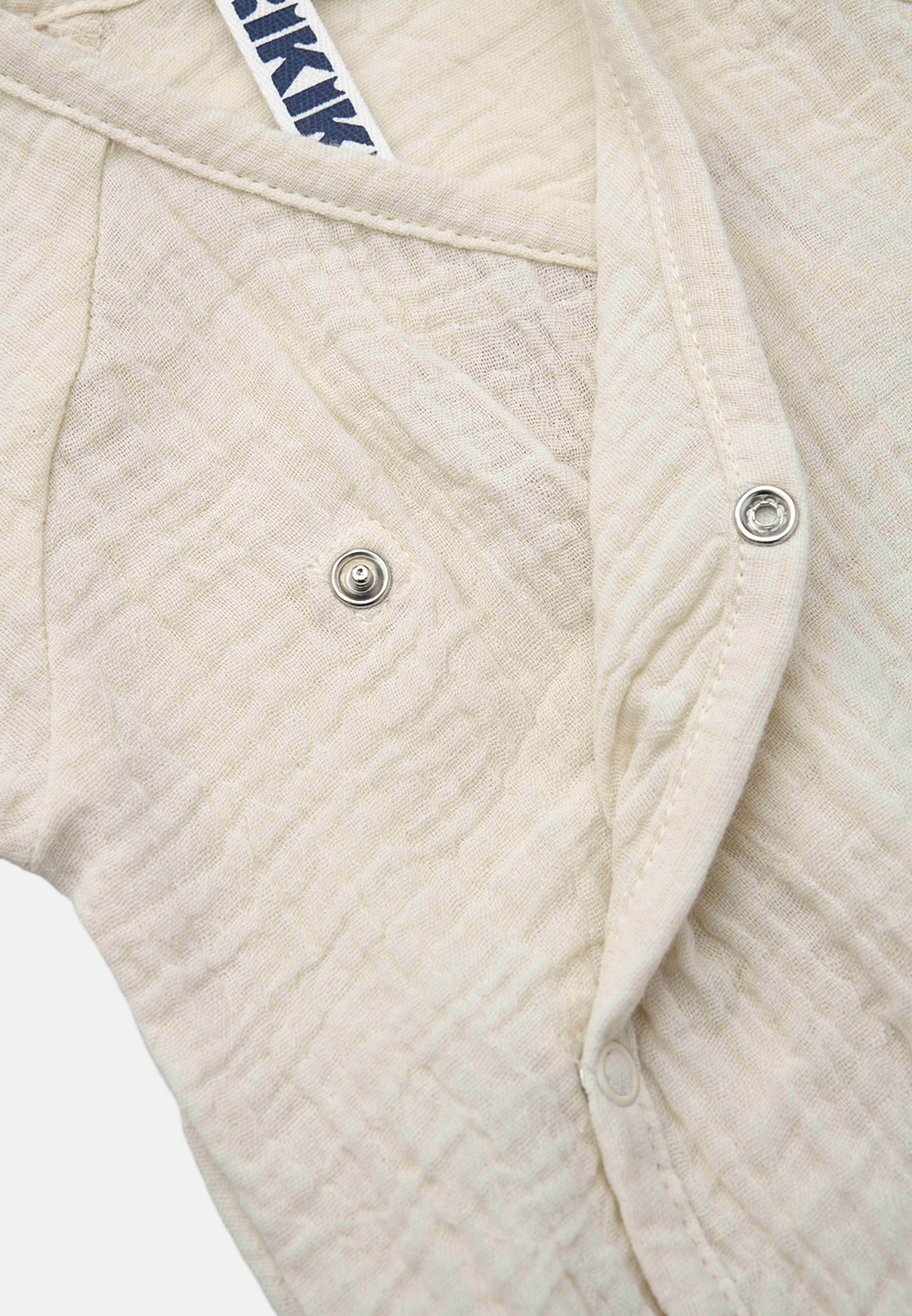 Set i krinklad bomull CAMI, från RIKIKI, i färgen Beige. Klicka för att öppna bilden i stort format