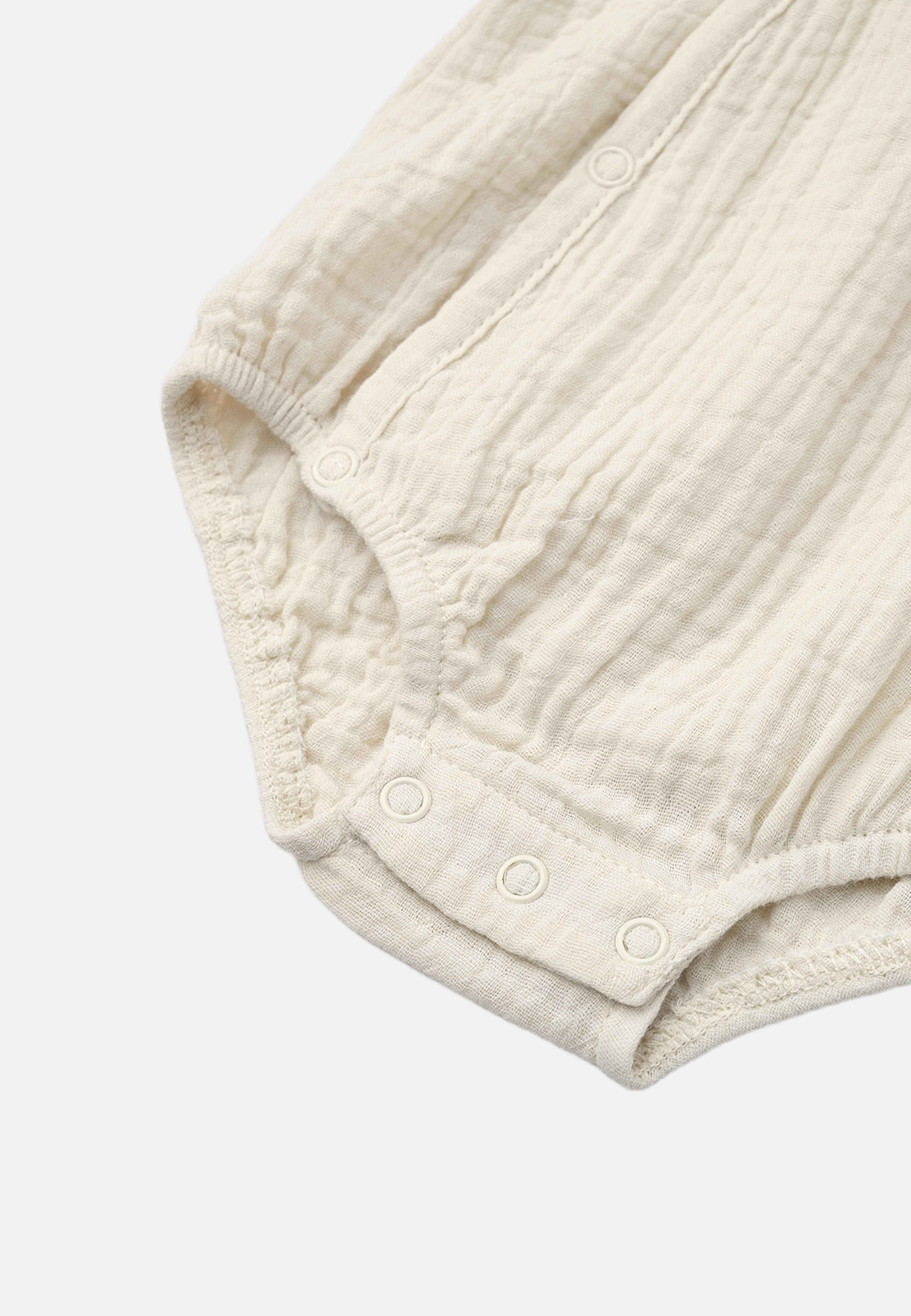 Set i krinklad bomull CAMI, från RIKIKI, i färgen Beige. Klicka för att öppna bilden i stort format