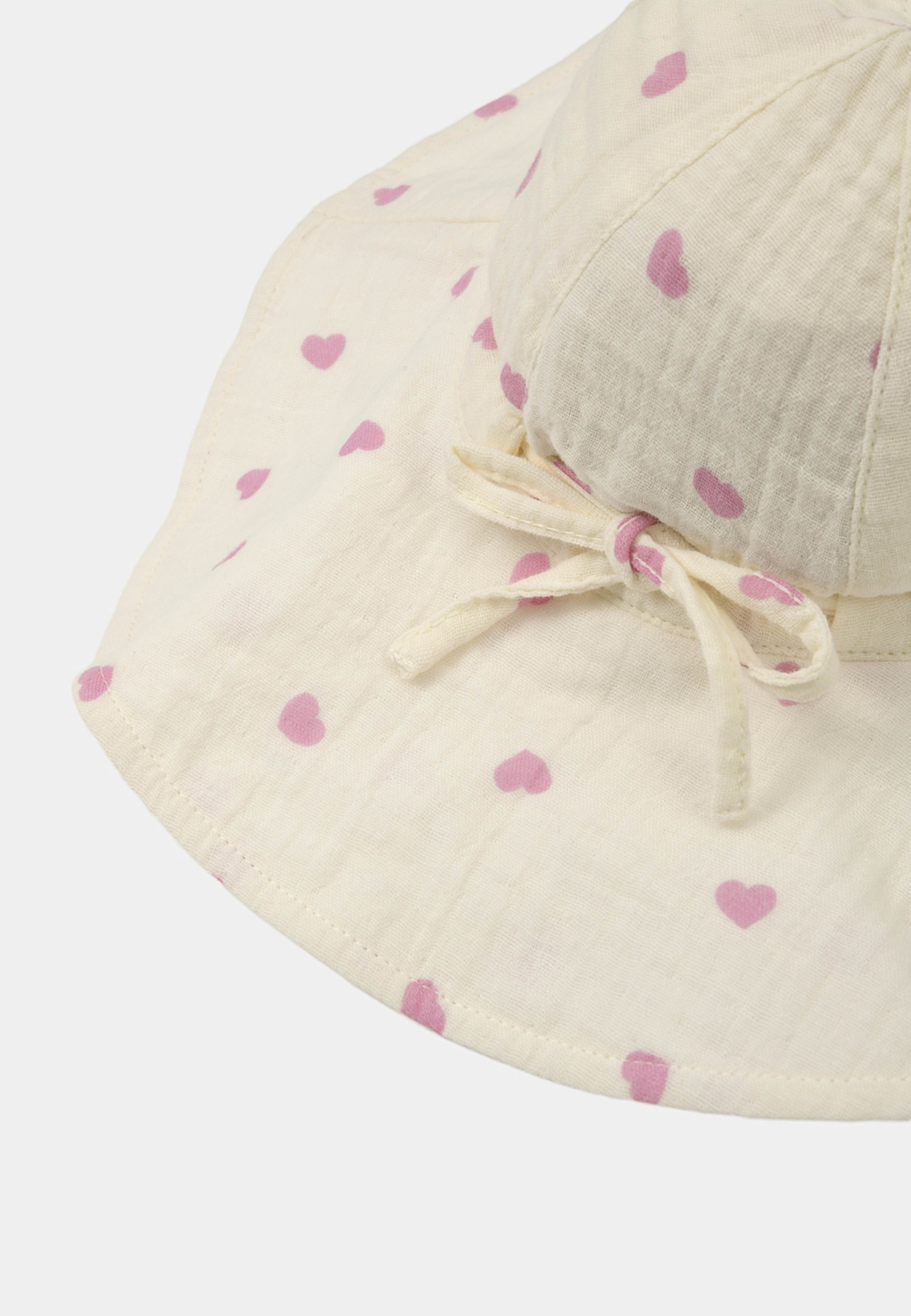 Solhatt i krinklad bomull FRED, från RIKIKI, i färgen Heart. Klicka för att öppna bilden i stort format