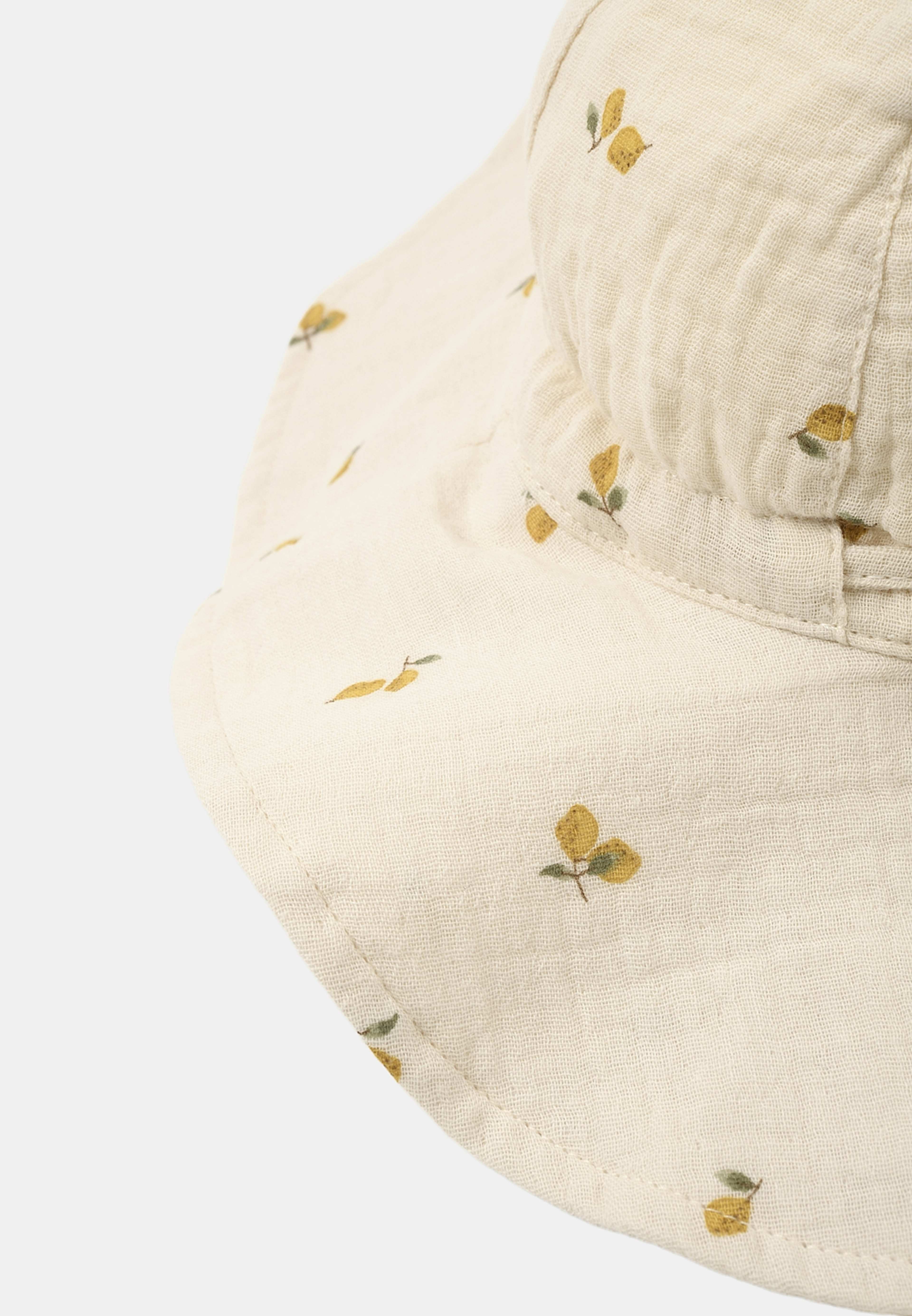 Solhatt i krinklad bomull FRED, från RIKIKI, i färgen Lemon. Klicka för att öppna bilden i stort format