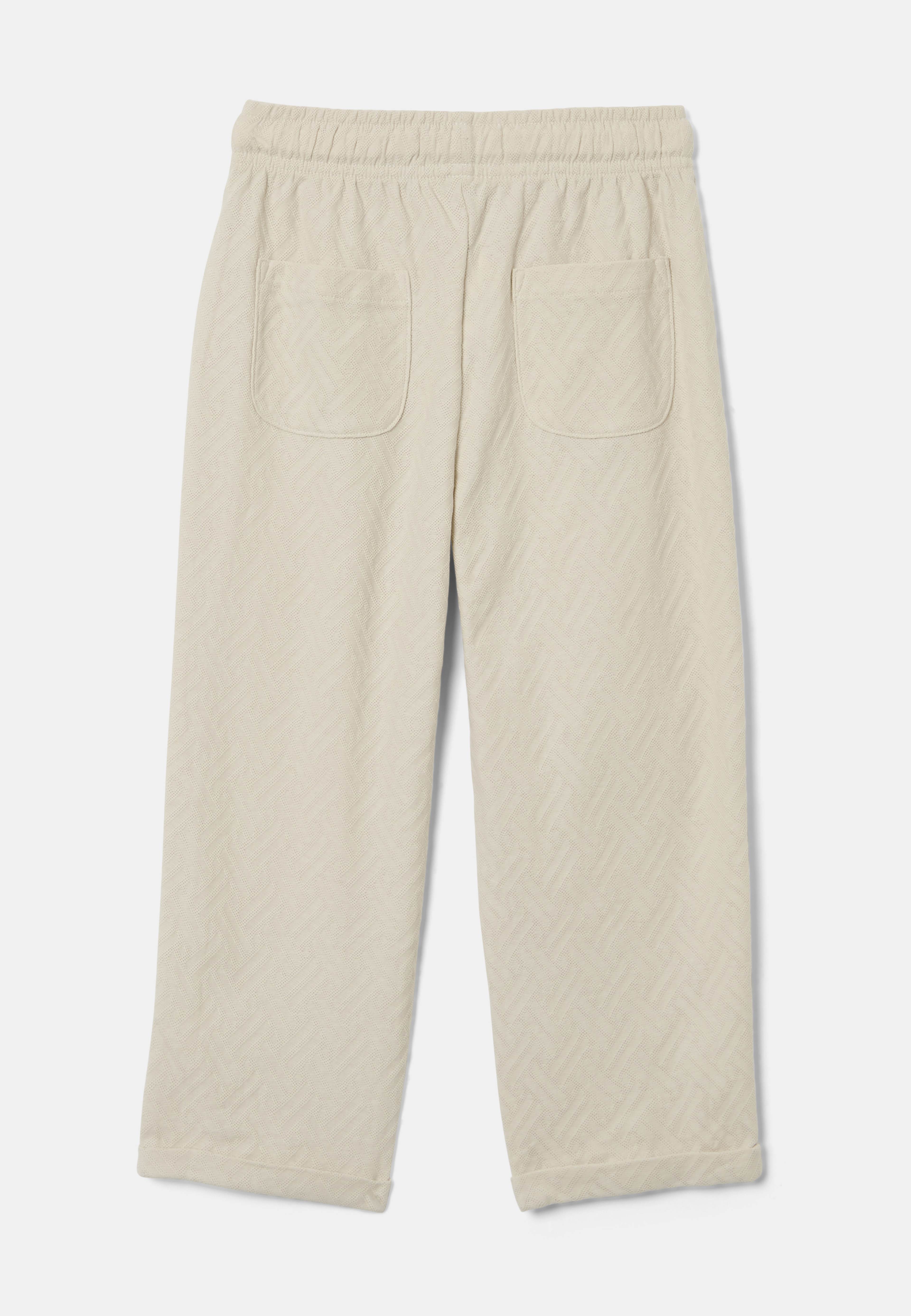 Byxor OTIS, från RIKIKI, i färgen Light Beige. Klicka för att öppna bilden i stort format