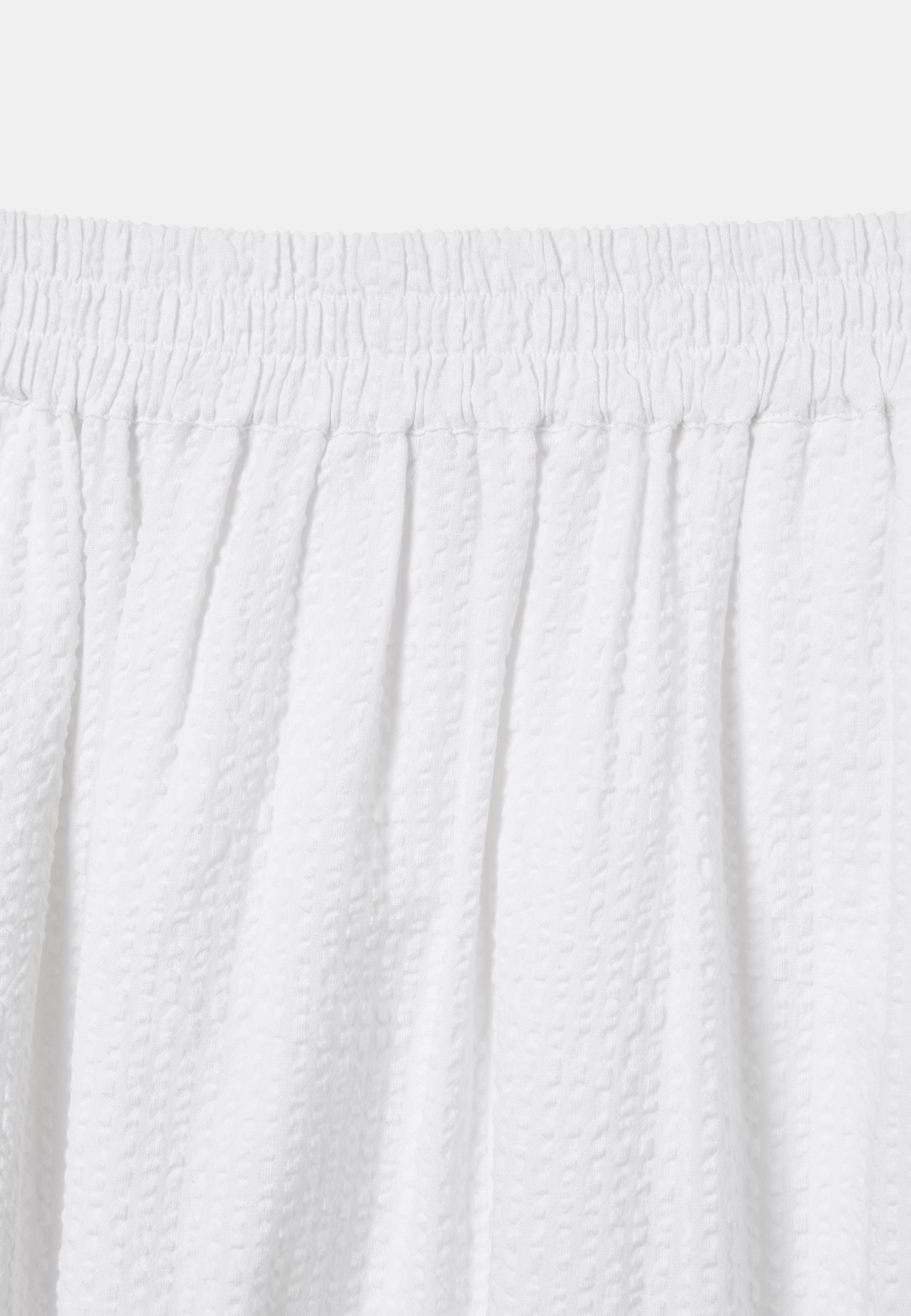 Kjol i bäckebölja FILIPPA, från Å WOMAN, i färgen White. Klicka för att öppna bilden i stort format