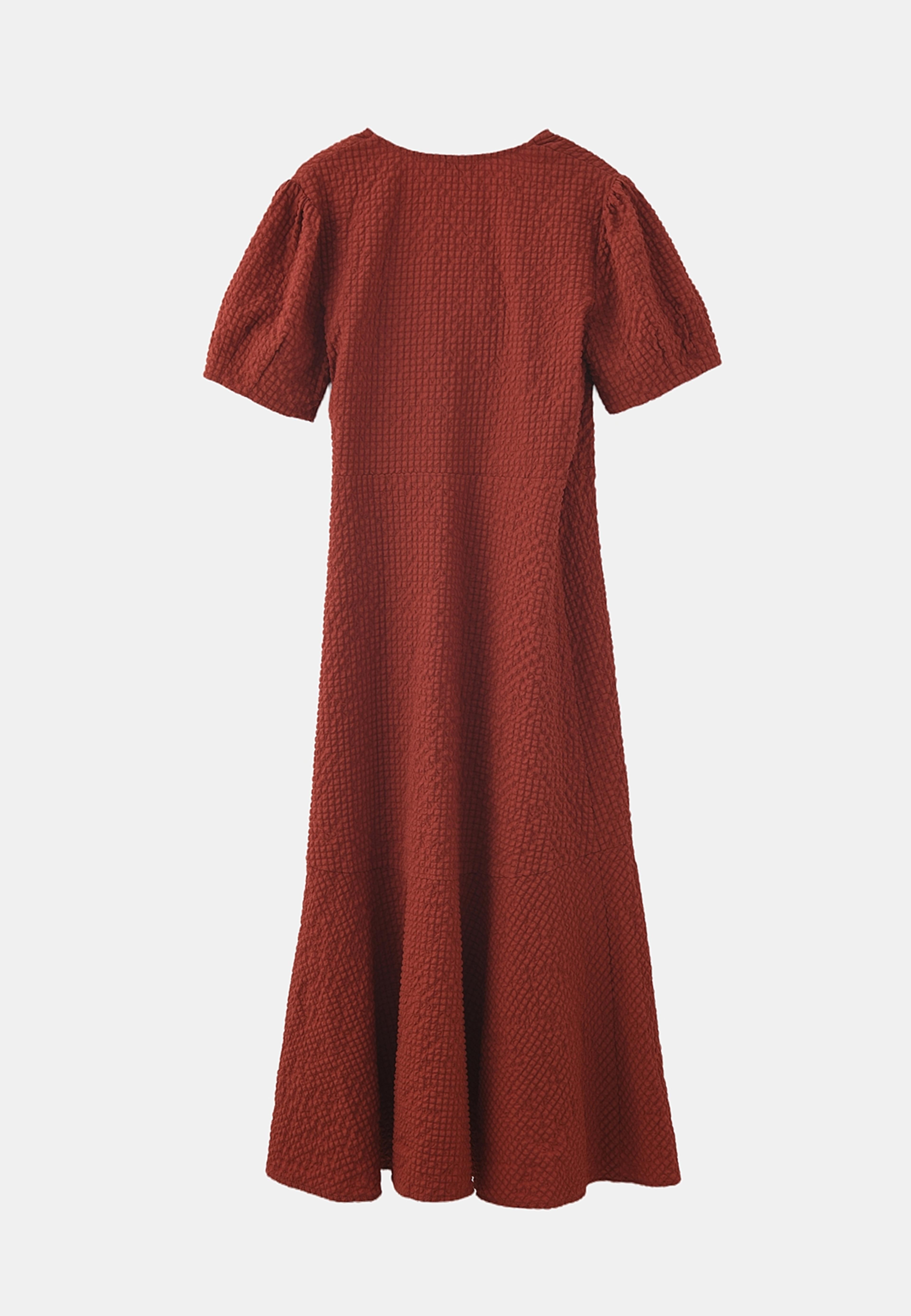 Omlottklänning AUGUSTI, från Carin Wester, i färgen Rust Red. Klicka för att öppna bilden i stort format