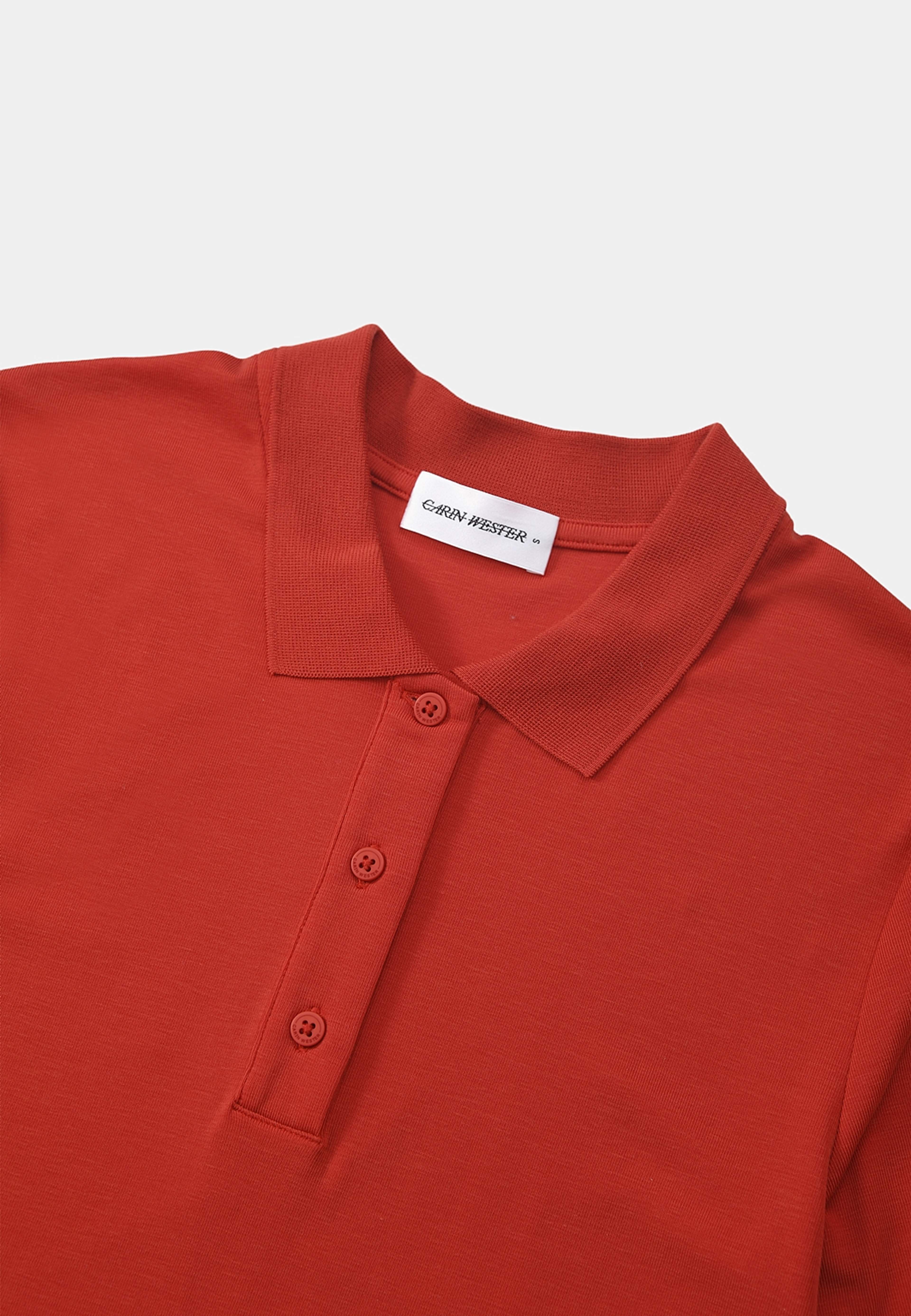 Pikétröja i lyocell IZMA, från Carin Wester, i färgen Rust Red. Klicka för att öppna bilden i stort format