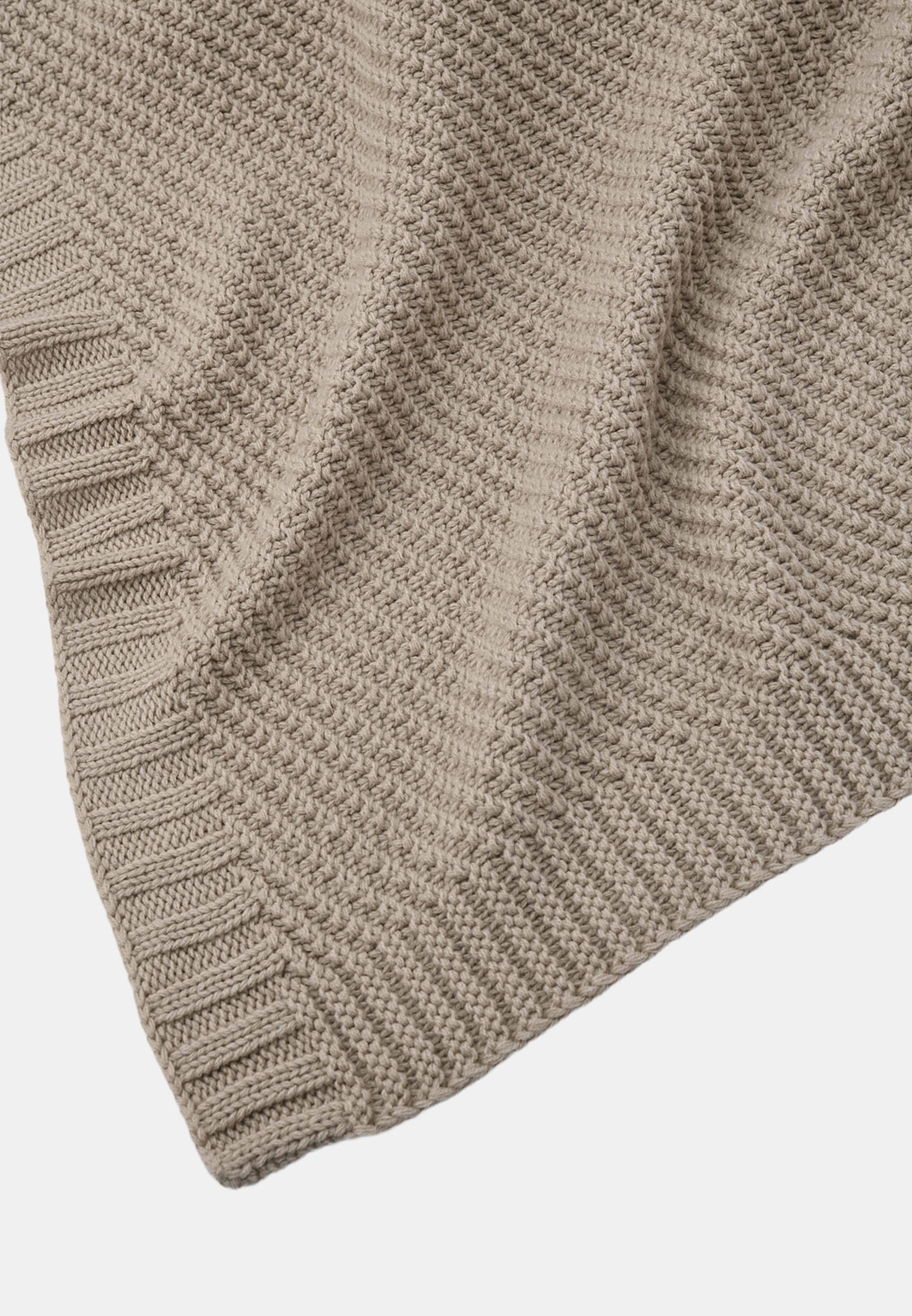 Pläd CLARA 130x170 cm, från Åhléns Home, i färgen Beige. Klicka för att öppna bilden i stort format