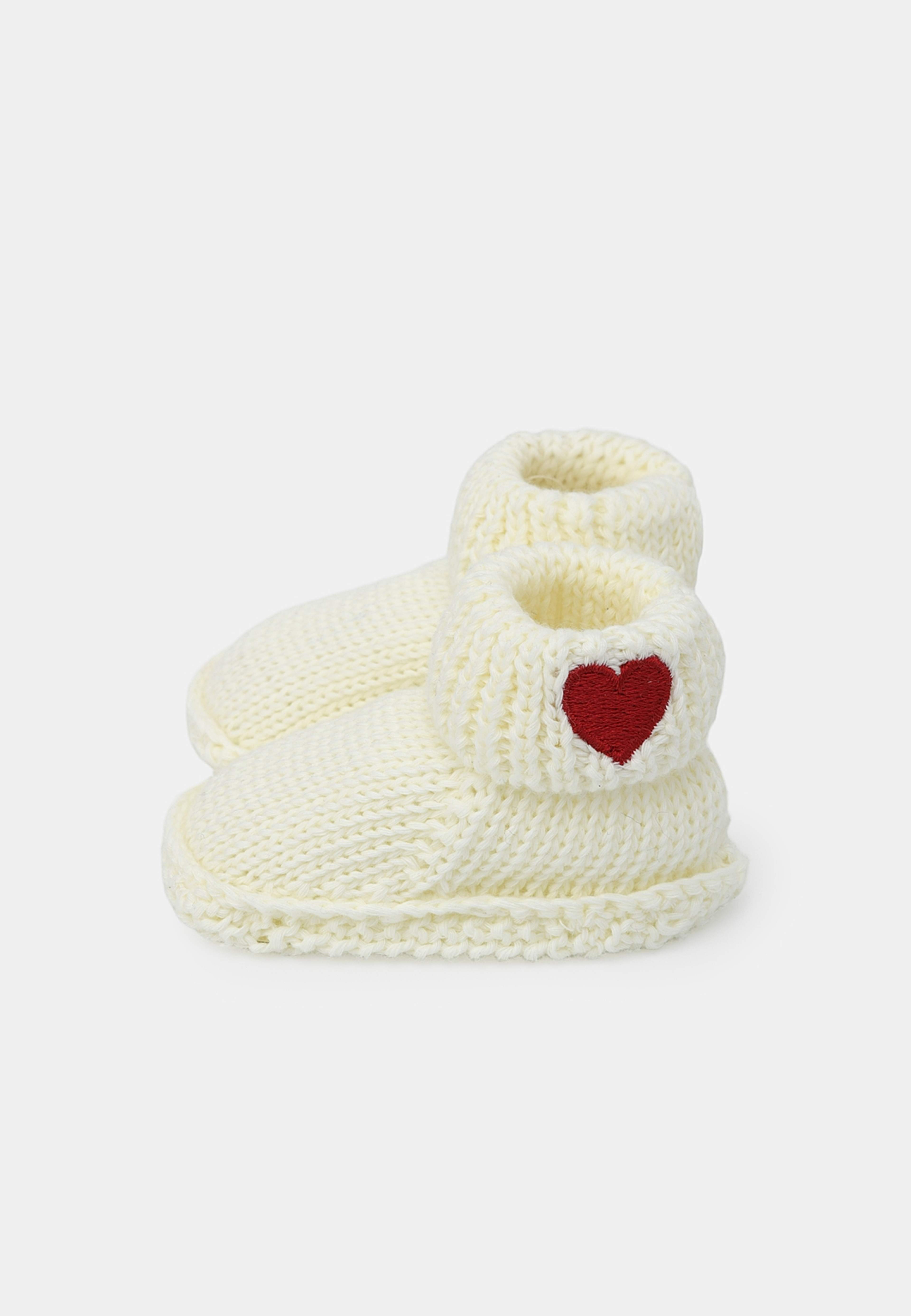Stickade tossor SWAN, från RIKIKI, i färgen Heart. Klicka för att öppna bilden i stort format