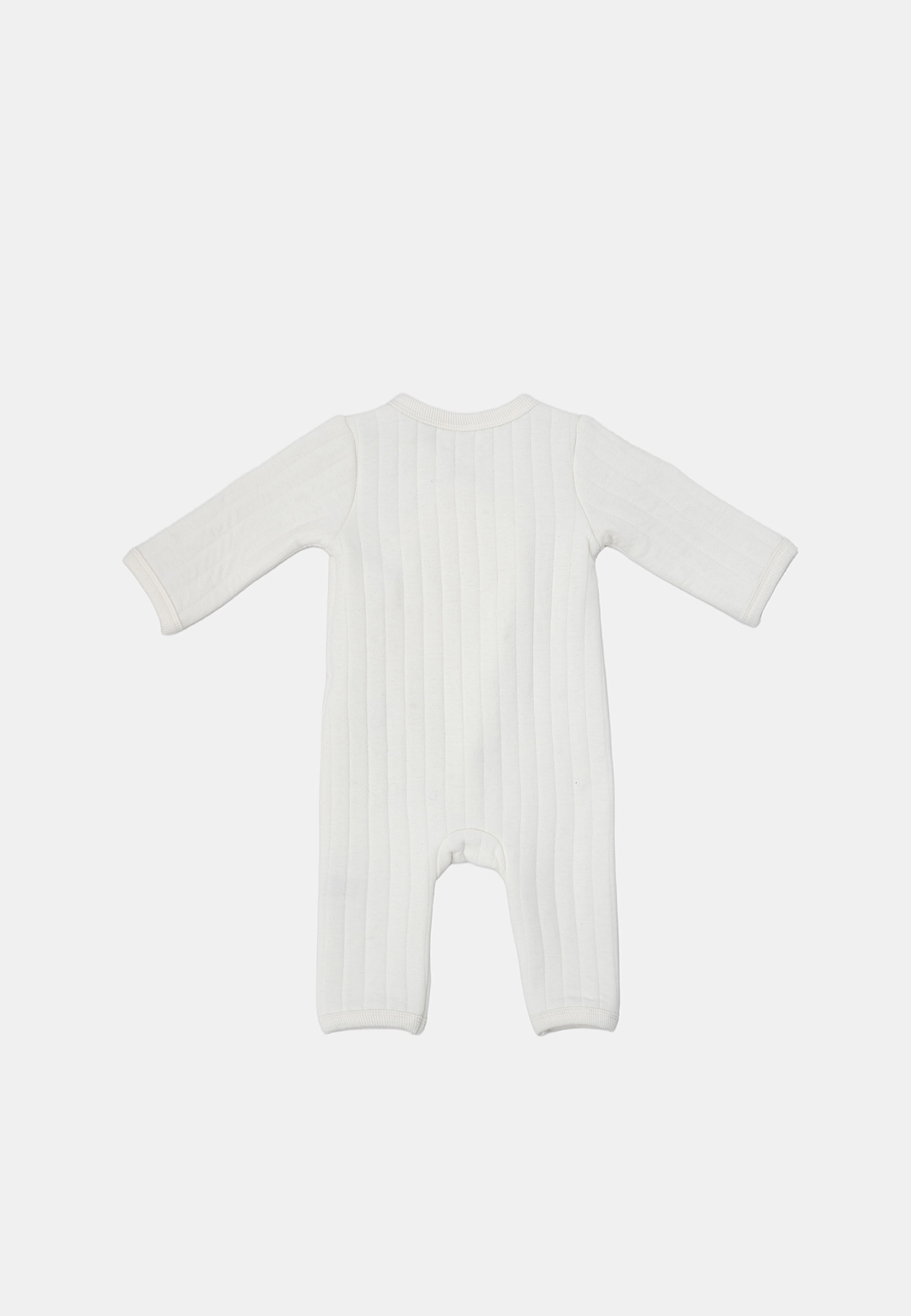 Quiltad onesie GUNNAR, från RIKIKI, i färgen White. Klicka för att öppna bilden i stort format