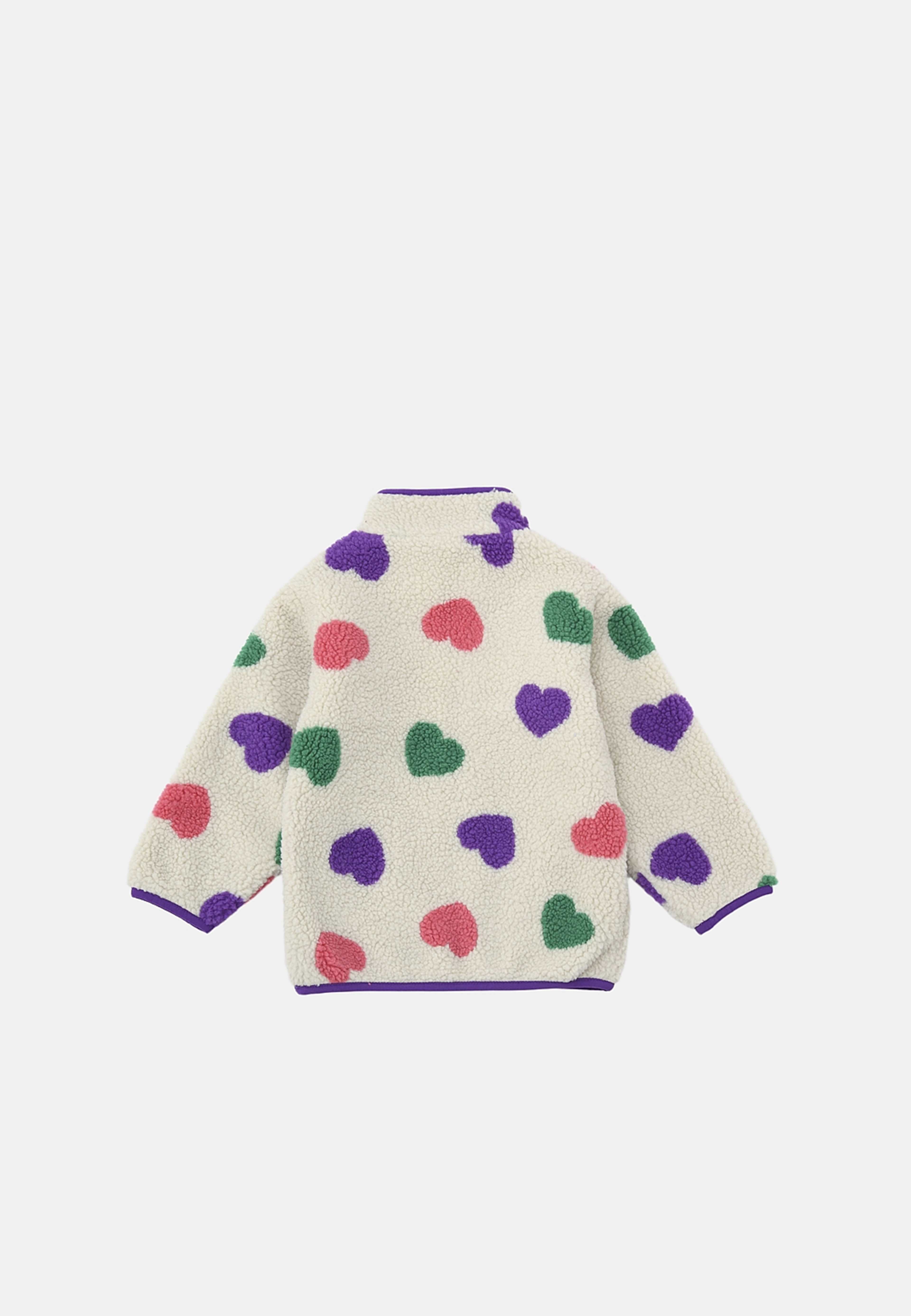 Teddyjacka CLAY, från RIKIKI, i färgen Multi Heart. Klicka för att öppna bilden i stort format