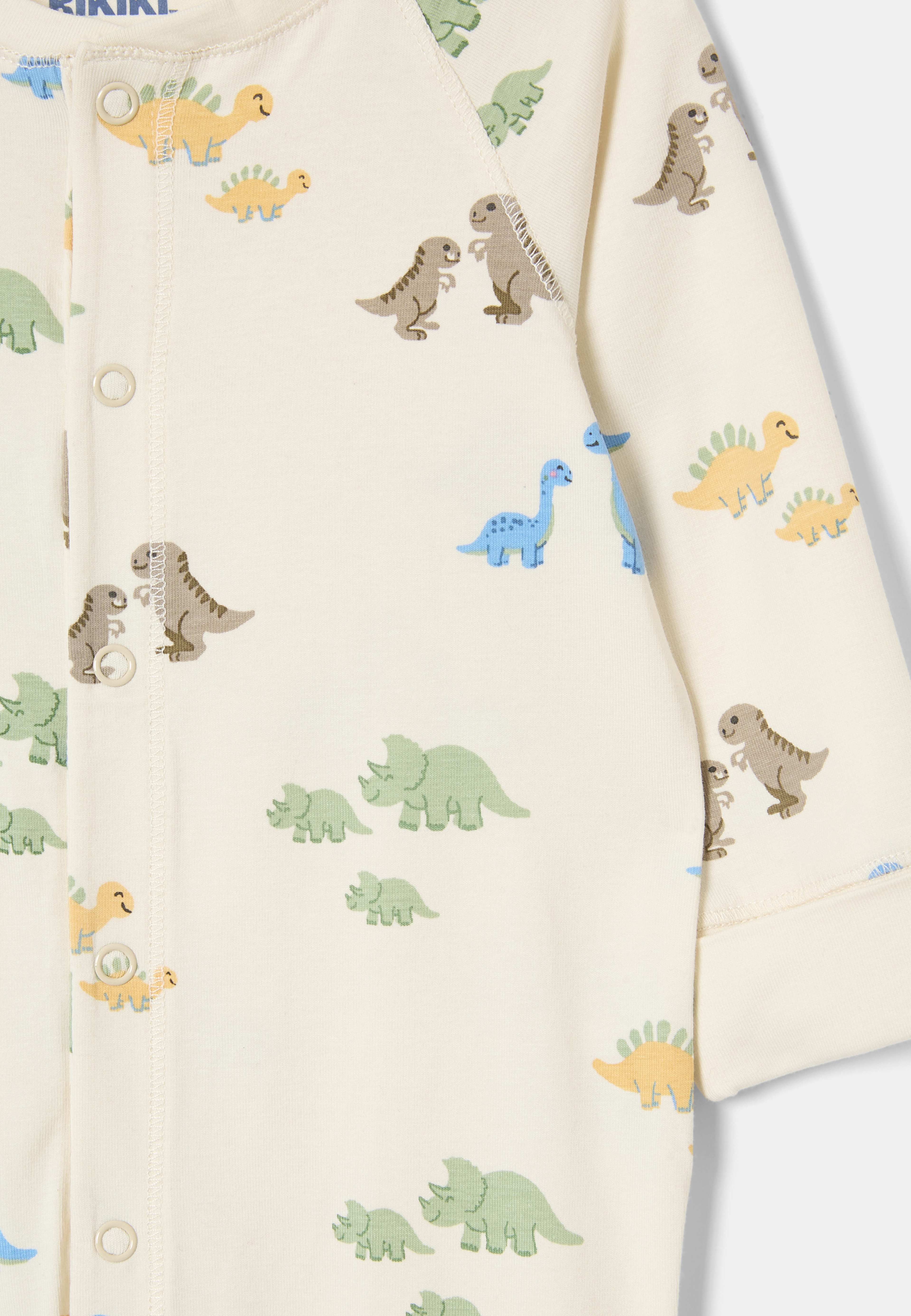 Pyjamas med tryckknappar STORM, från RIKIKI, i färgen Dino. Klicka för att öppna bilden i stort format