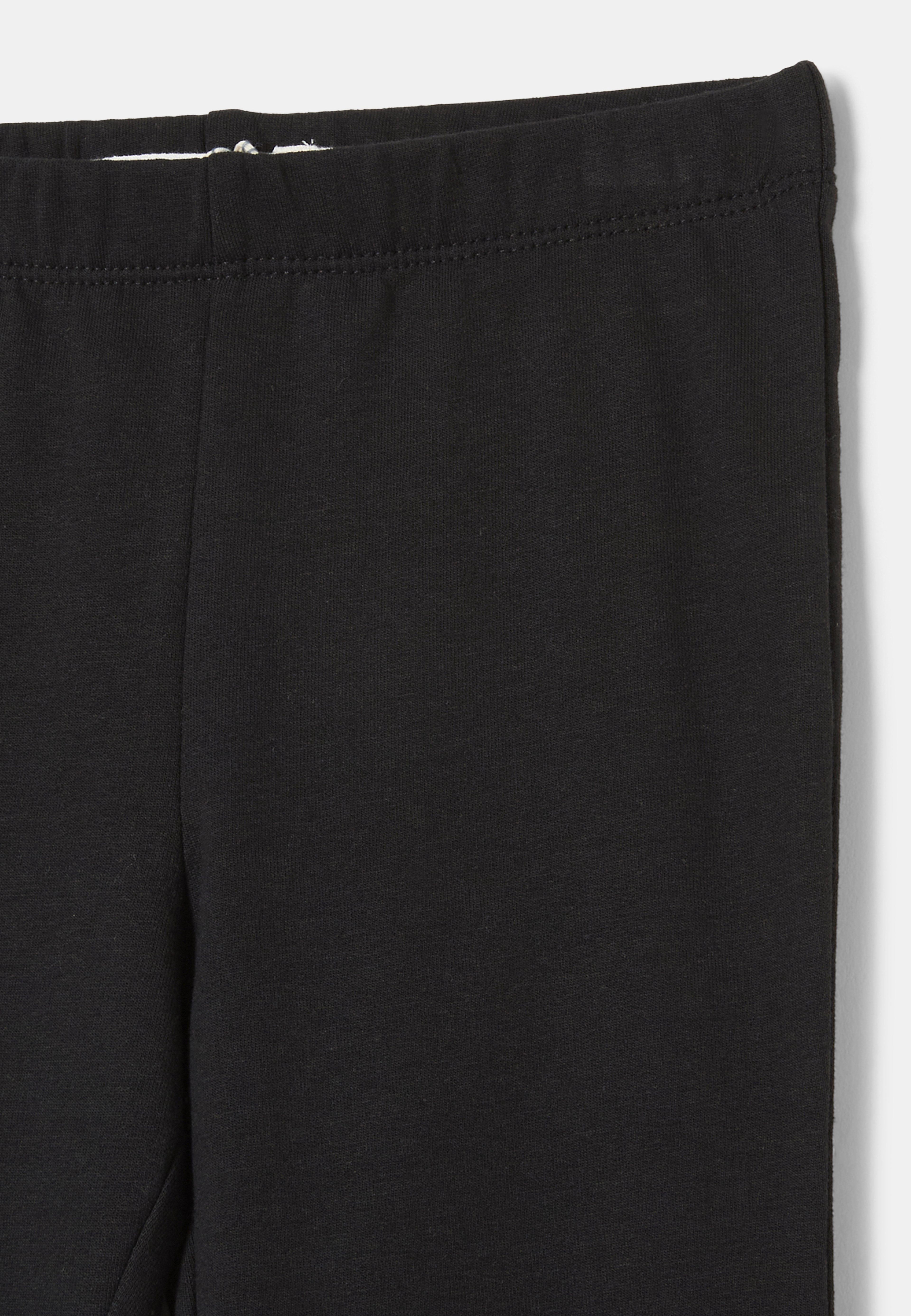 Utsvängda leggings HARPER, från RIKIKI, i färgen Black. Klicka för att öppna bilden i stort format