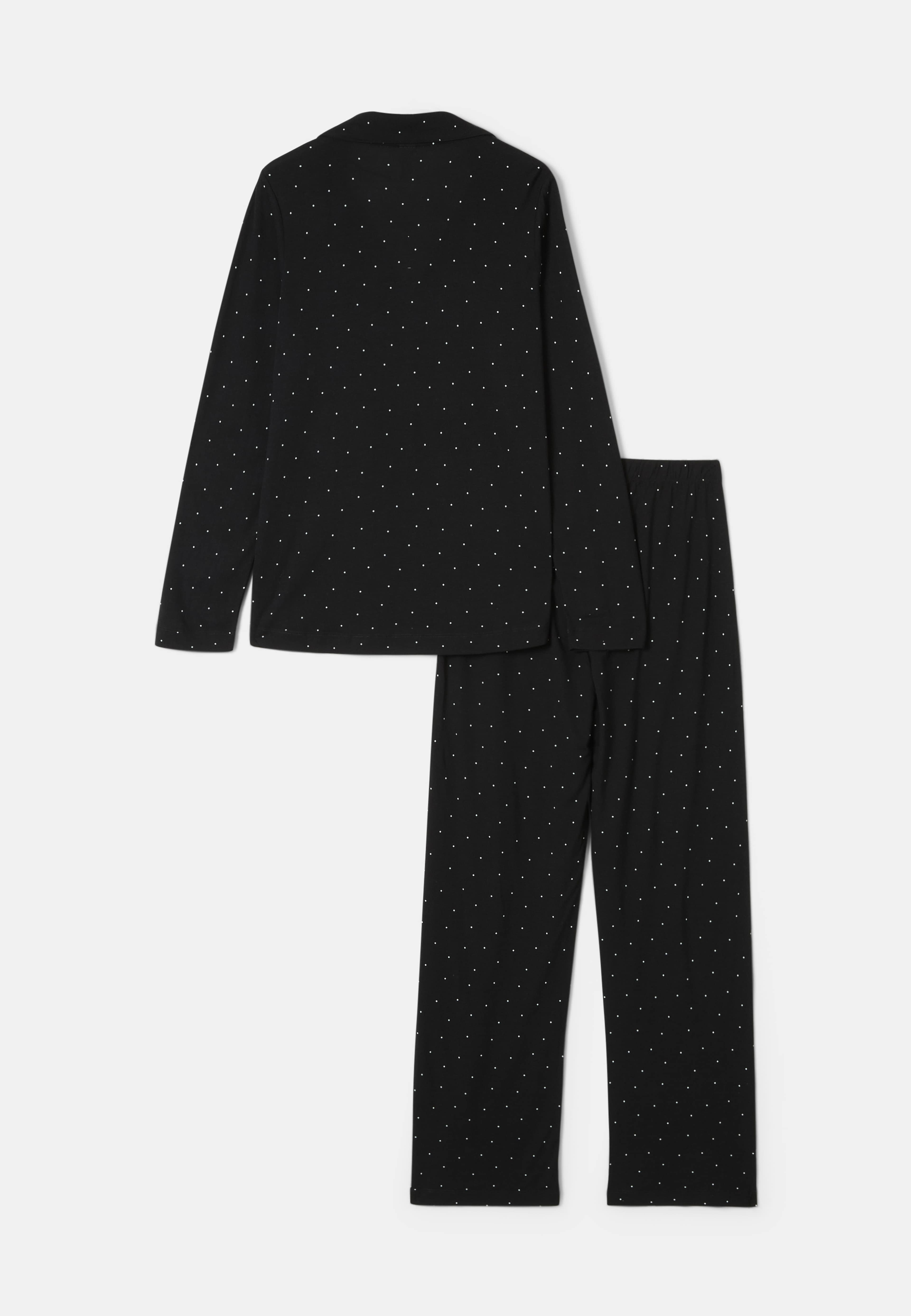 Pyjamas UMA, från Å WOMAN, i färgen Black Dot. Klicka för att öppna bilden i stort format