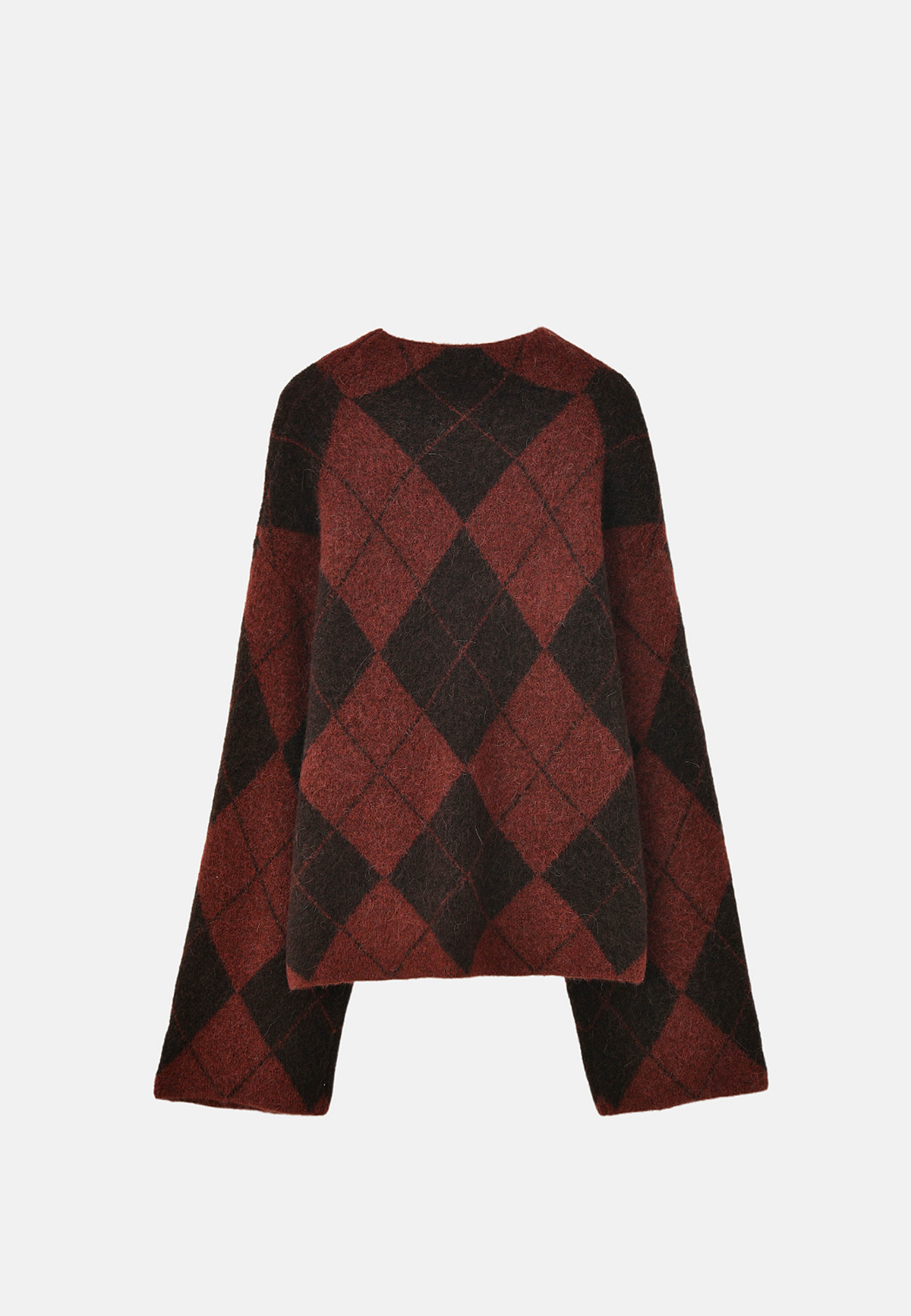 Mönstrad jumper LILLE, från Carin Wester, i färgen Argyle Rust. Klicka för att öppna bilden i stort format
