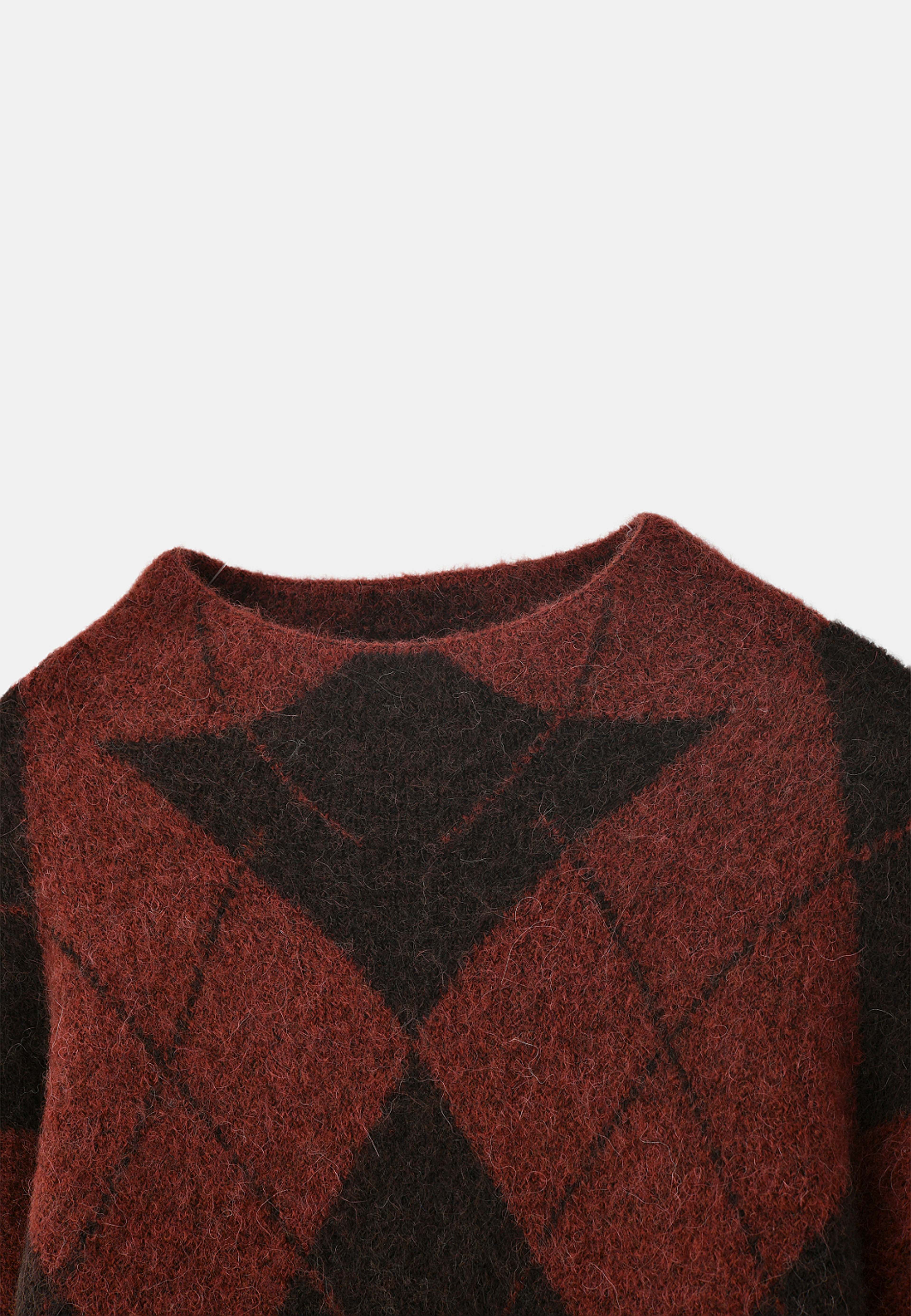 Mönstrad jumper LILLE, från Carin Wester, i färgen Argyle Rust. Klicka för att öppna bilden i stort format