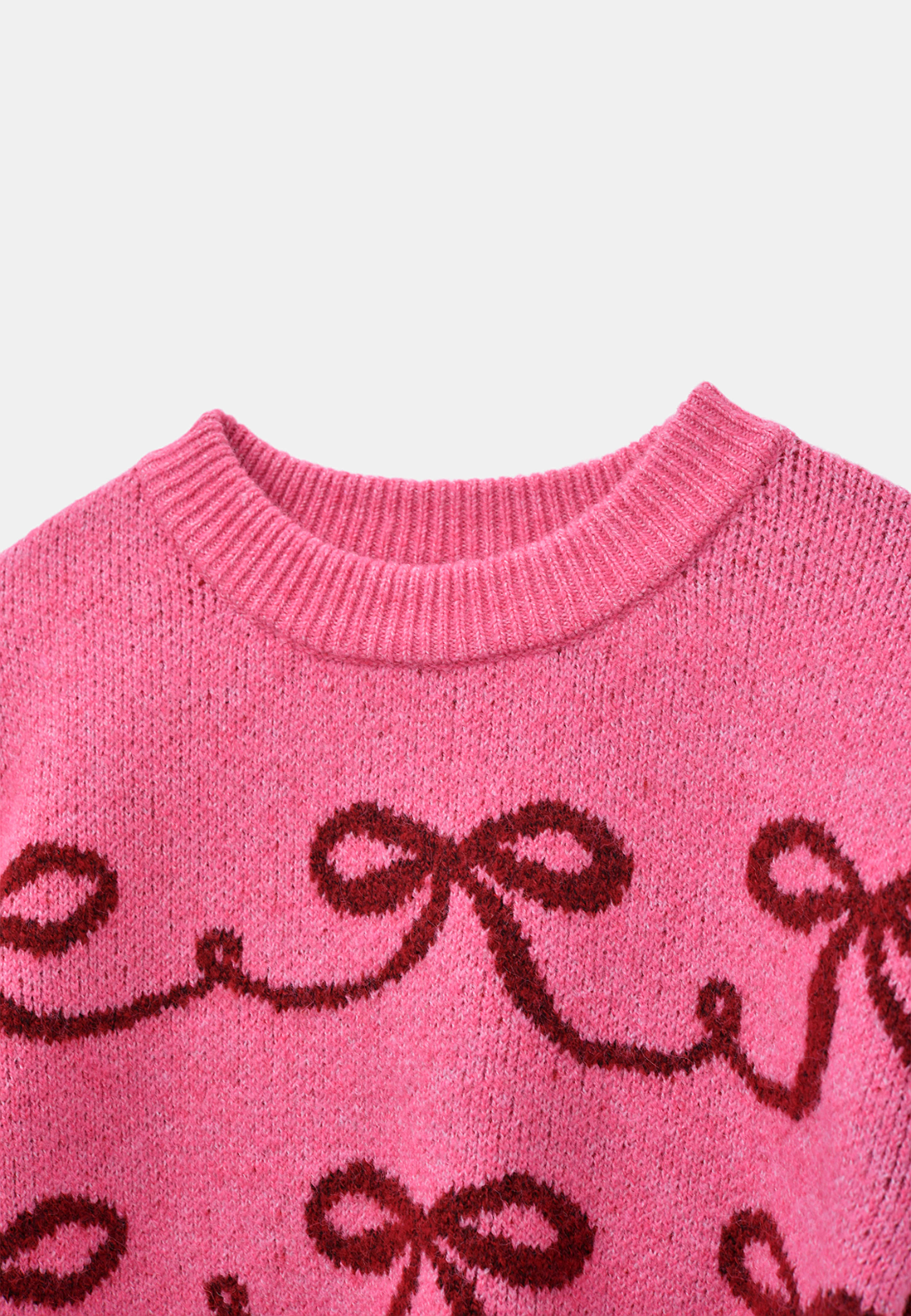 Tröja med rosetter MIRA, från RIKIKI, i färgen Pink. Klicka för att öppna bilden i stort format