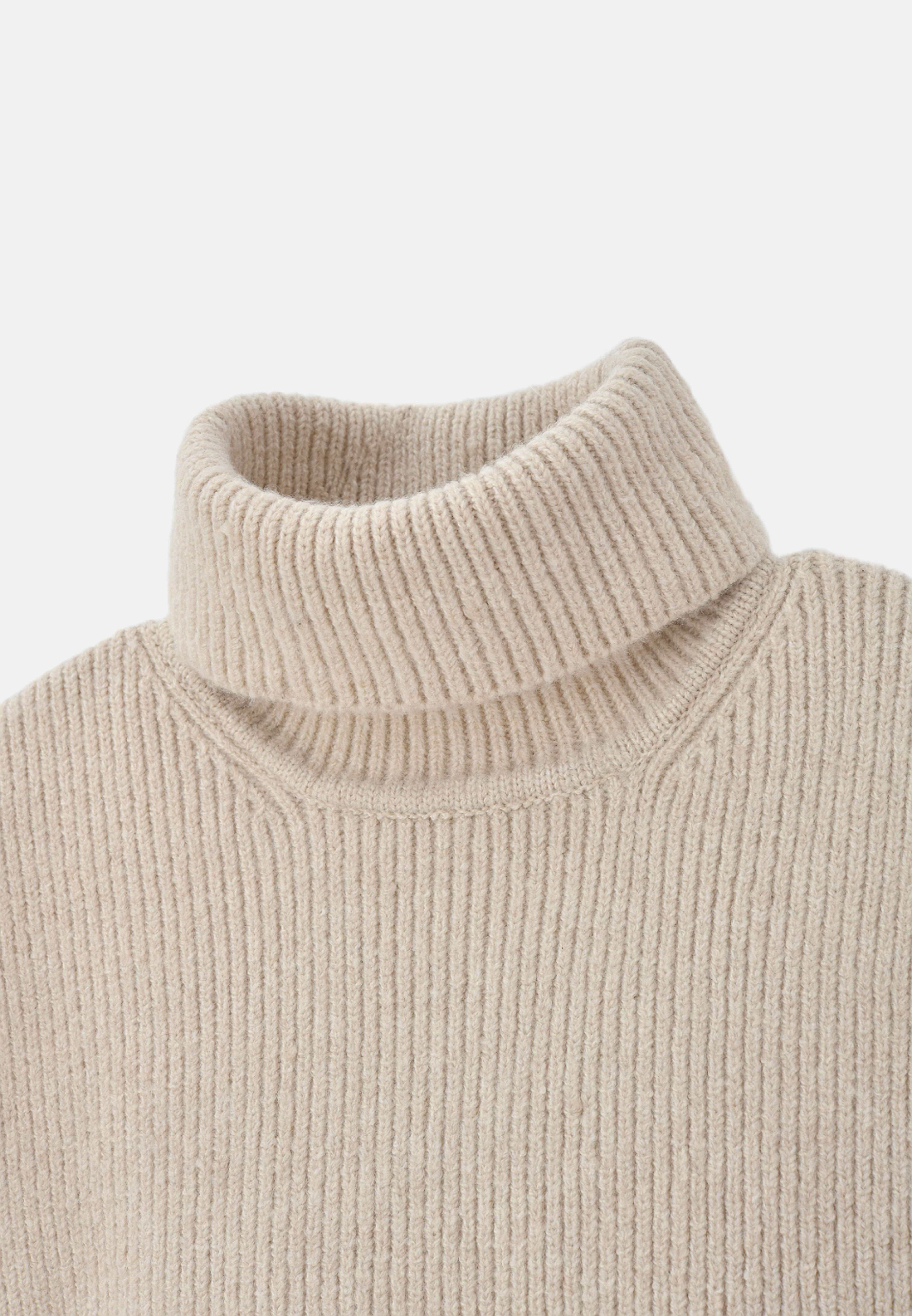 Fuskpolo INA, från Å WOMAN, i färgen Off White. Klicka för att öppna bilden i stort format